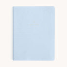 The Simplified 2025-2026 Dapperdesk Planner in Carolina Dot boasts a light blue leatherette cover, featuring subtle polka dots and 2025 to 2026 in small gold letters. This elegant 12-month bookbound weekly planner is perfect for organizing your year with style.