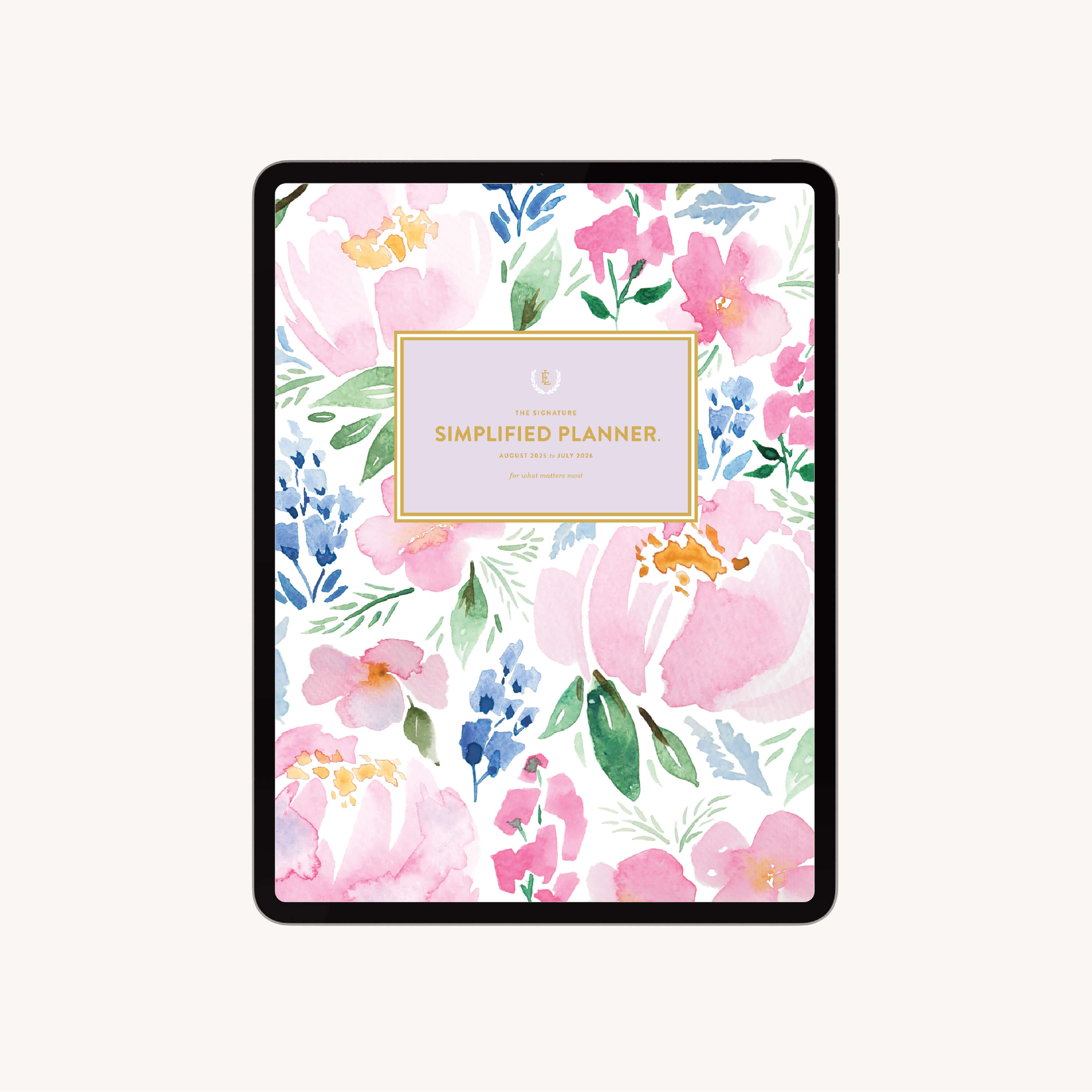 A digital tablet displays the 2025-2026 Digital Simplified Planner for iPads by Simplified, featuring a pink, purple, and blue watercolor floral cover with green leaves and a gold-bordered box reading Simplified Planner at the center.