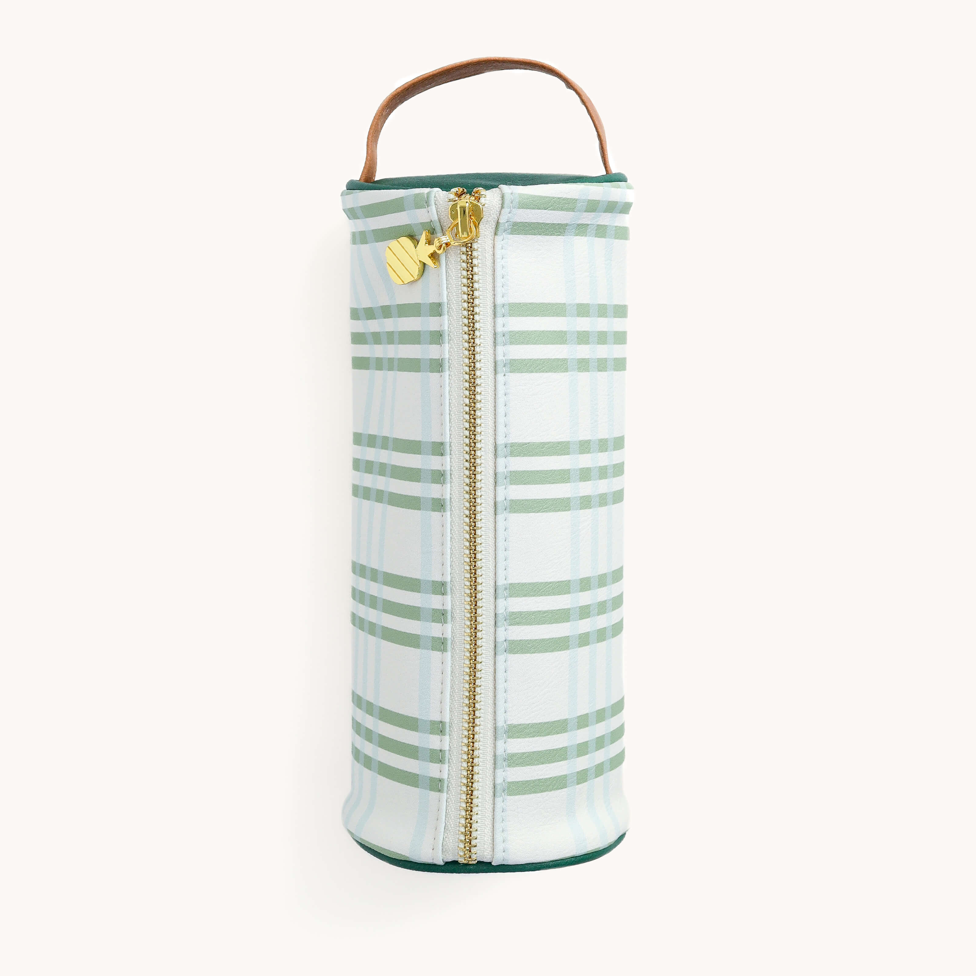 The Pen Case - Pistachio Plaid by Simplified is cylindrical, featuring a green and white plaid pattern, a gold zipper with a small bee charm, and a brown leather handle.