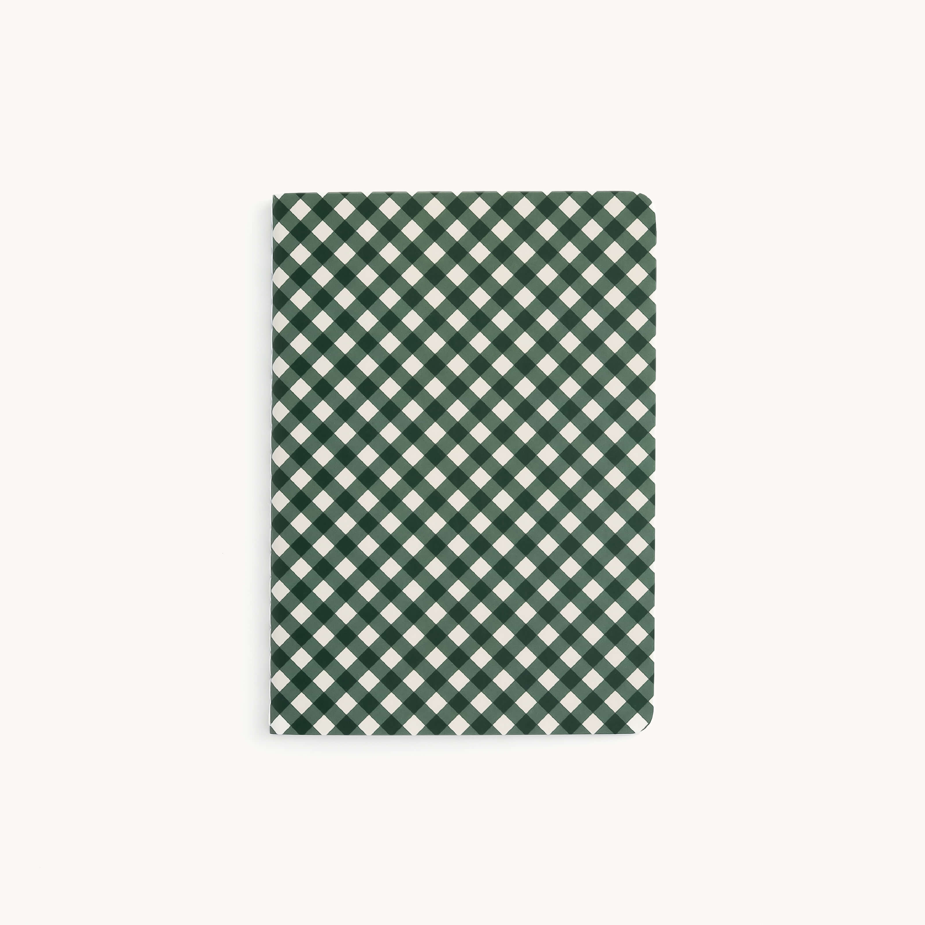The Mini Notebook - Camp Gingham by Simplified features a custom green-and-white checkered cover with small squares in an alternating grid pattern, laying flat on a plain light surface.