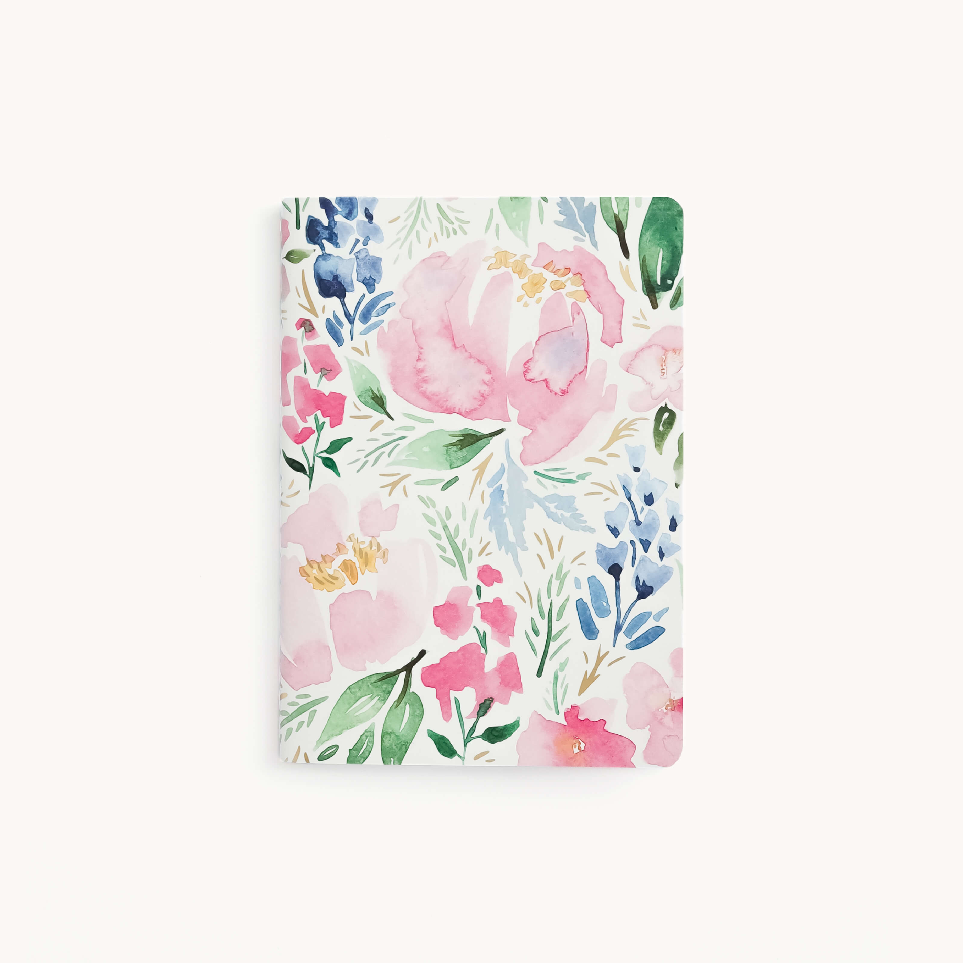 The Simplified Mini Notebook - Cottage Floral features a durable, thick paper cover with custom watercolor patterns of pink, blue, and green flowers and leaves on a white background, adding an elegant touch.