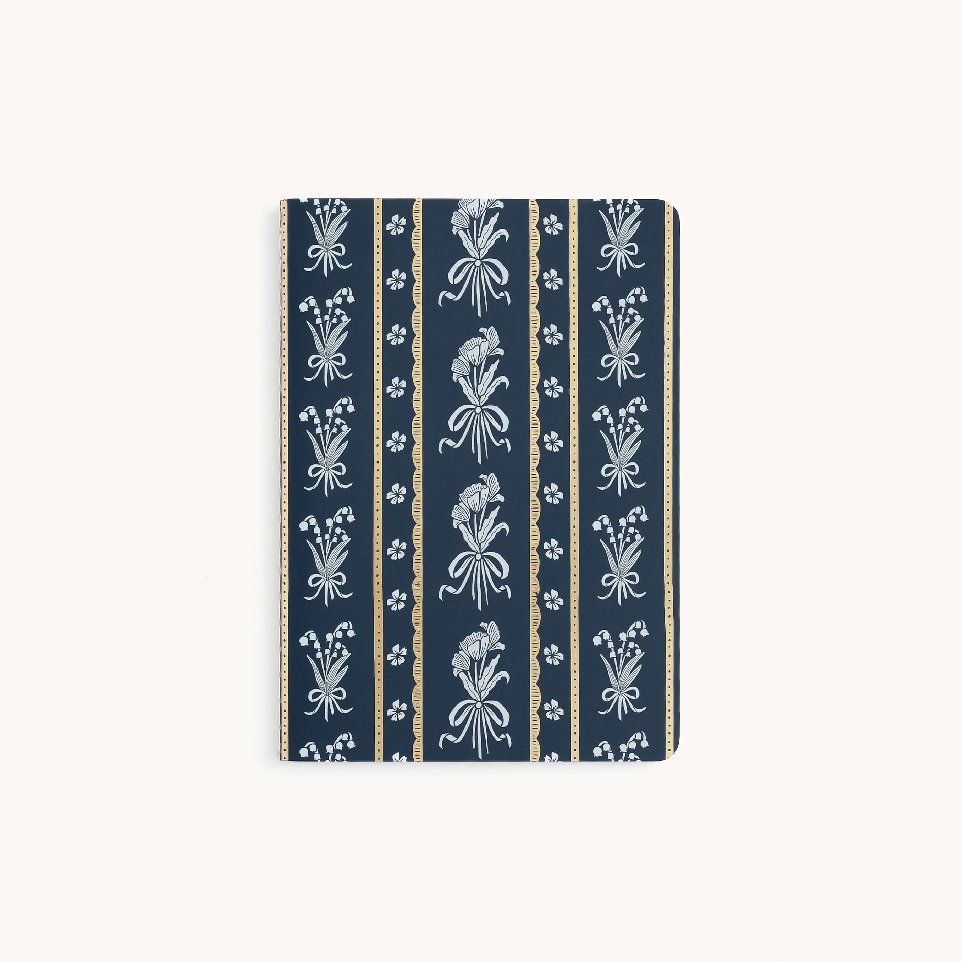 The Simplified Mini Notebook - Poppy Posies features a thick paper cover in dark blue with custom vertical beige stripes adorned with ornate floral designs, inspired by classical motifs for an elegant and sophisticated look.
