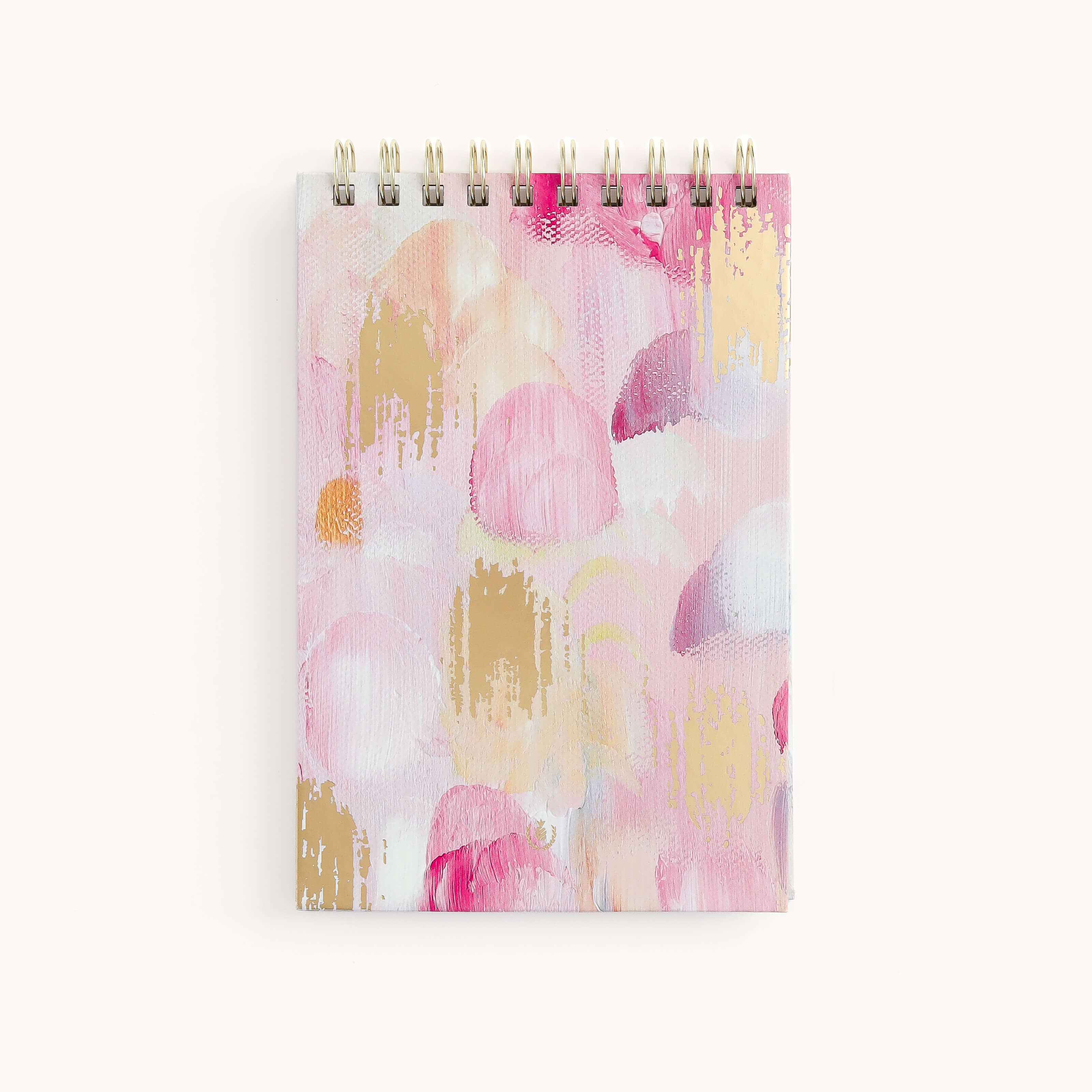 The Top Spiral Notepad - Happy Abstract by Simplified, featuring pastel pink, gold, and cream brushstrokes on a white background, is an elegant gift that blends style and sentiment perfectly.