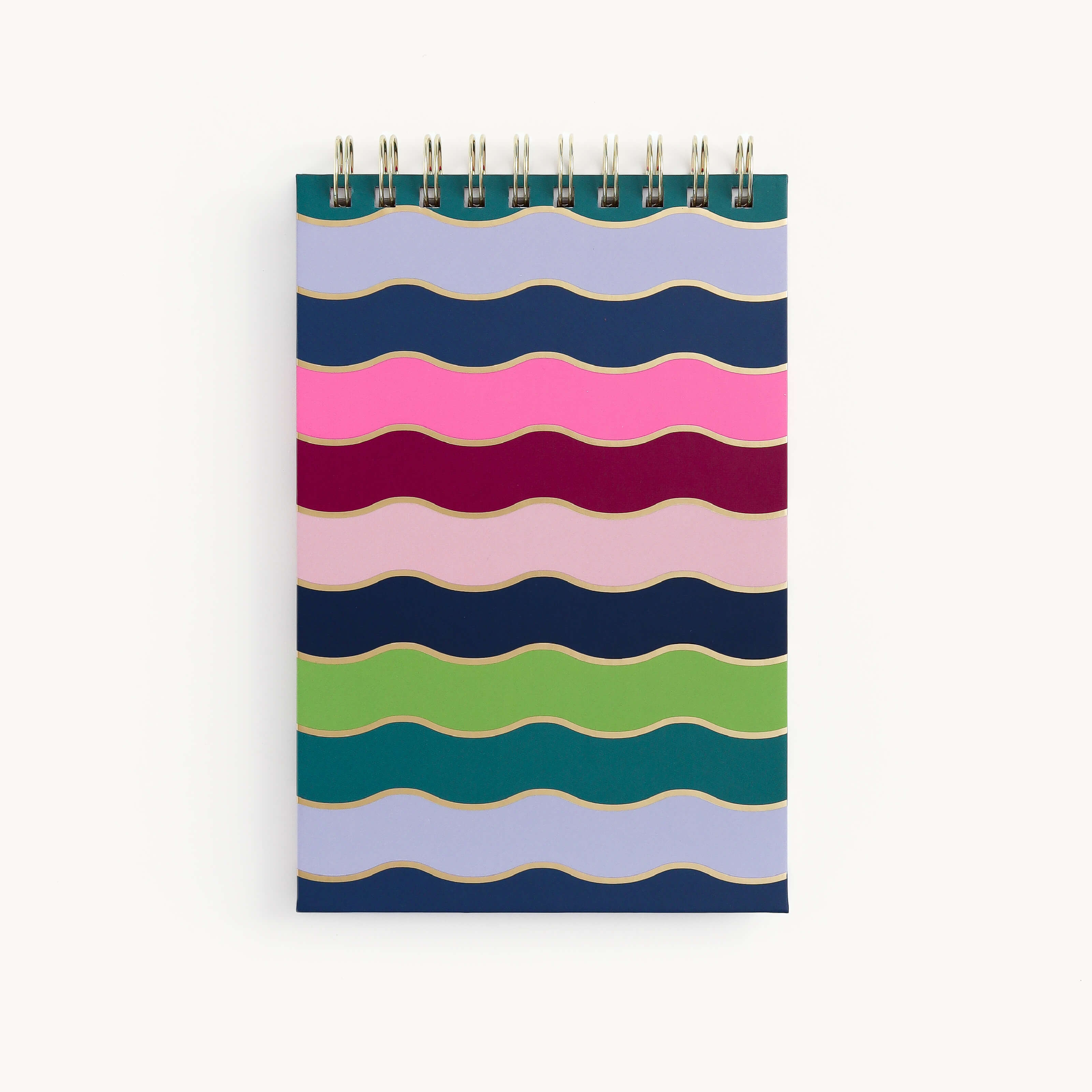 The Top Spiral Notepad - Rainbow Row by Simplified is an ideal gift, featuring vibrant wavy horizontal stripes in pink, red, navy, green, and blue on a plain background. Its gold bow notepad design adds elegance to your lined notes.