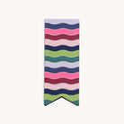 The Page Marker - Rainbow Row by Simplified features a rectangular design with wavy stripes in blue, pink, green, purple, and red on a light backdrop. Its pointed bottom edge adds a planner-style charm.