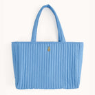 Simplified by Emily Ley | Quilted Tote Bag in French Blue, featuring a soft cotton exterior with a signature fold pineapple embellishment.
