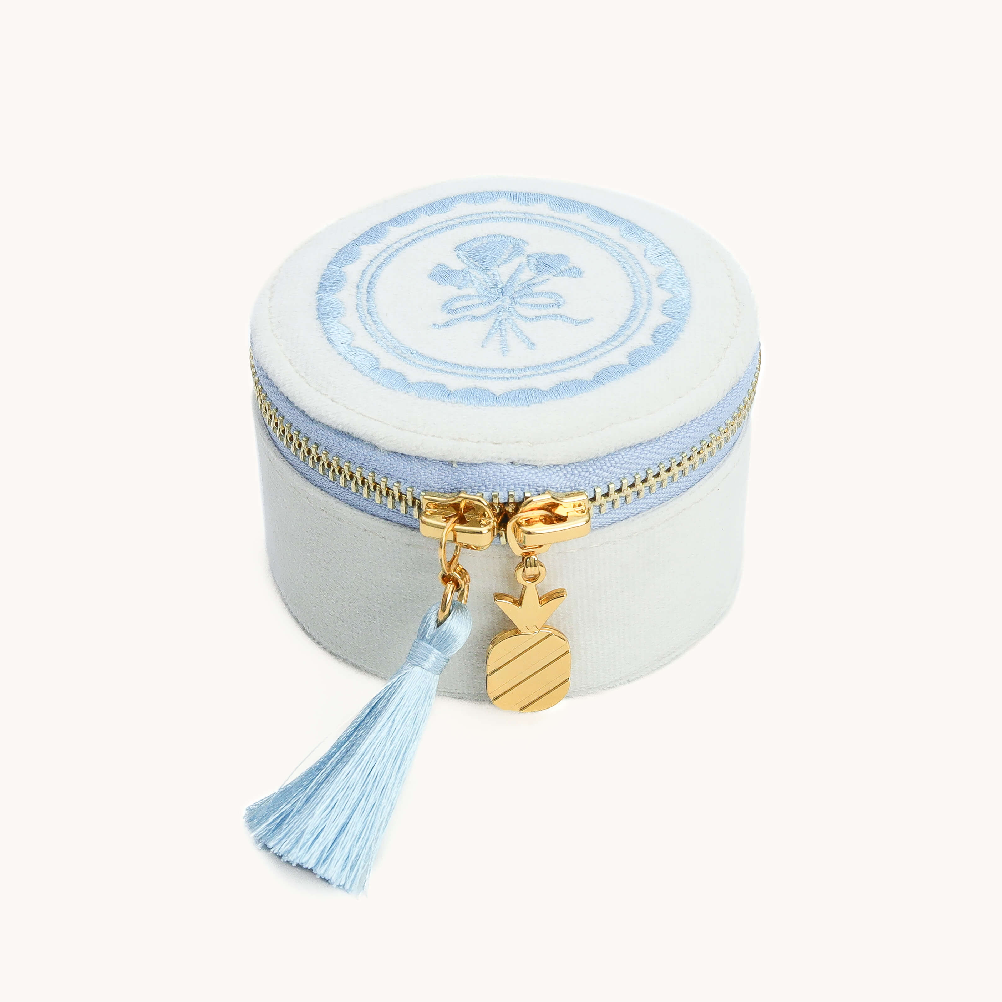 Ivory floral travel jewelry organizer with gold zipper and tassel by Simplified by Emily Ley