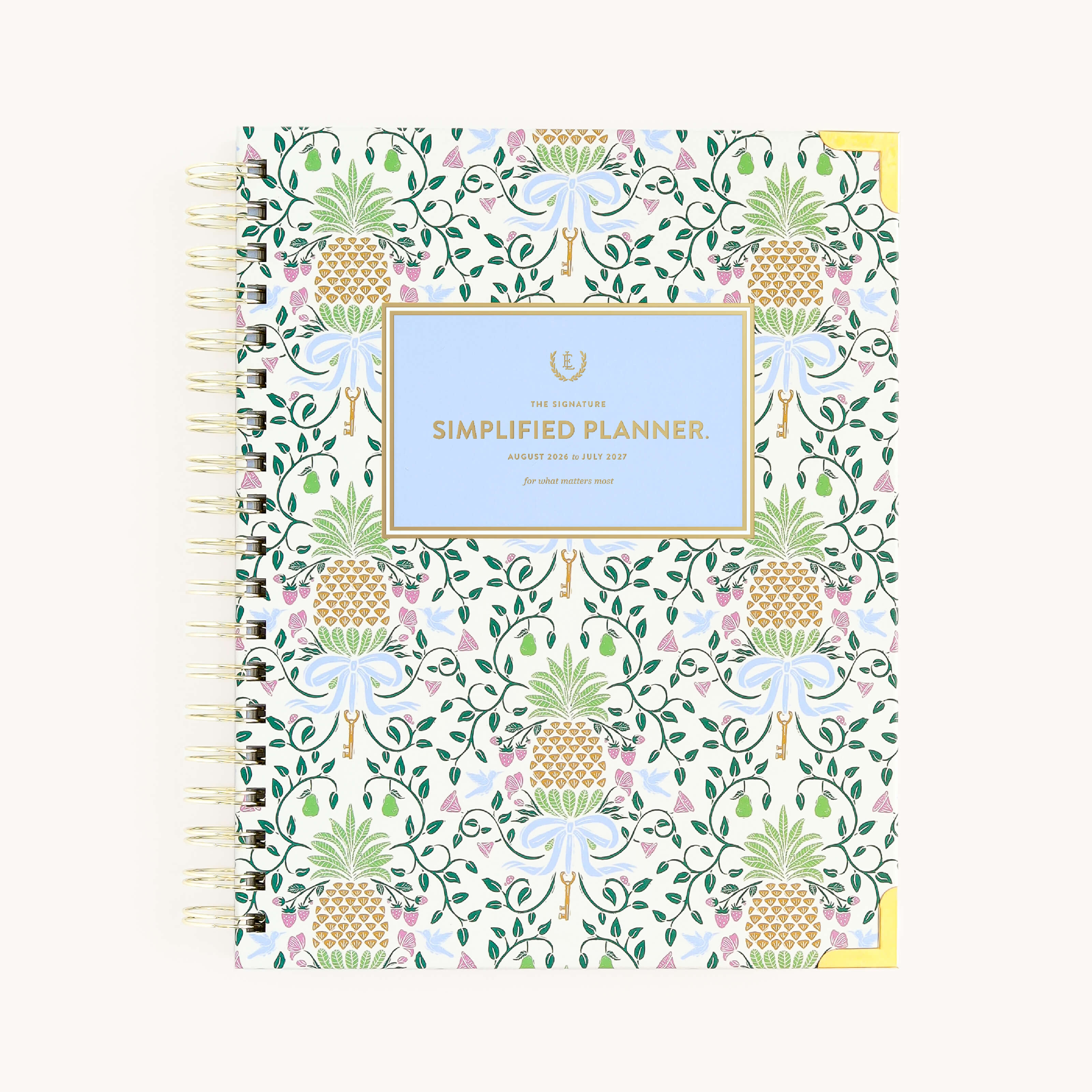 Pineapple Charm spiral weekly planner with illustrated Pineapple cover, gold corners, and wire binding for easy weekly planning