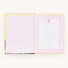 The book Growing Boldly by Emily Ley, from the Simplified brand, features a vibrant yellow cover. Inside, pink and white striped endpapers greet you, with the right page offering pink spaces labeled To, From, and Date for personal notes or stories of courage.