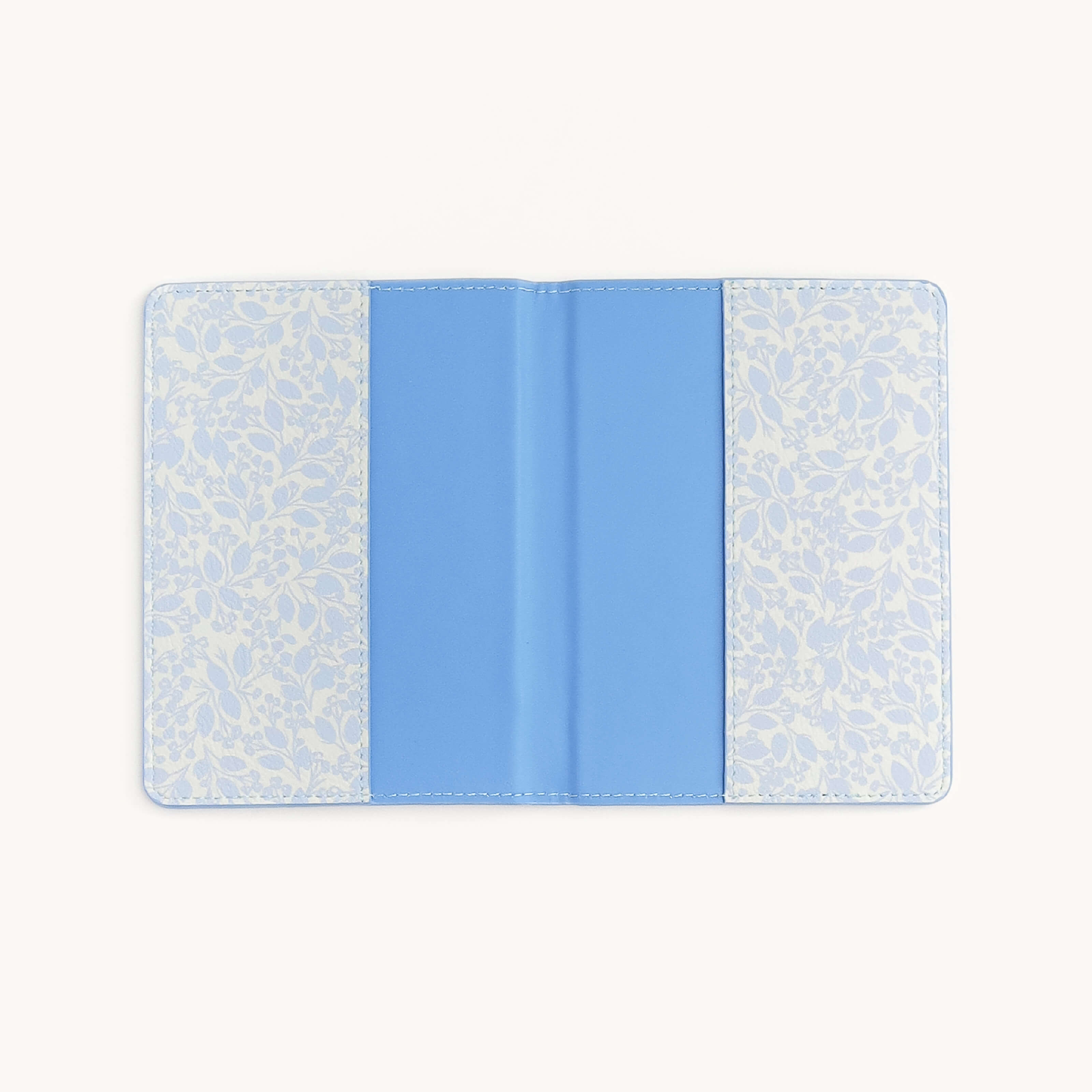 Open Misty Meadow passport holder with interior card slots by Simplified by Emily Ley