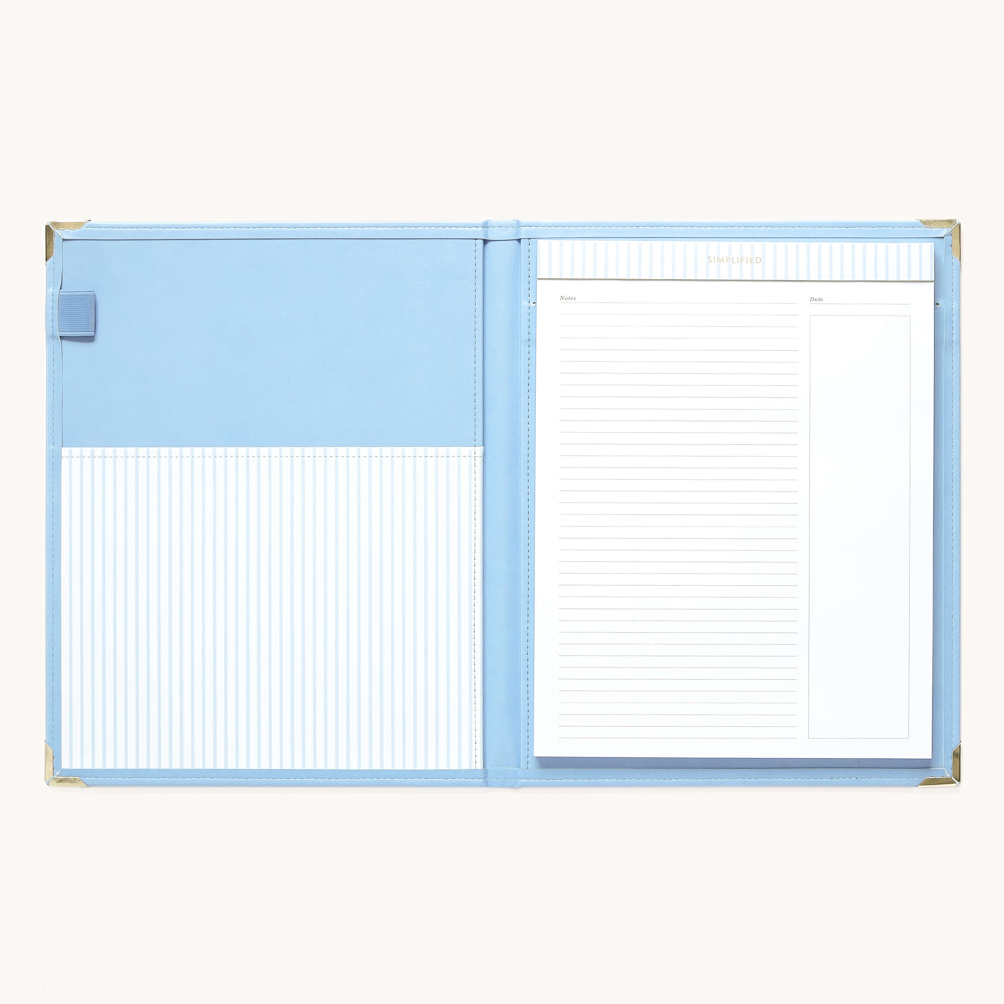 The Simplified Leatherette Folio - French Blue features gold corner protectors, a large left pocket, a removable legal pad with notes column on the right, and an interior with blue and white stripes.