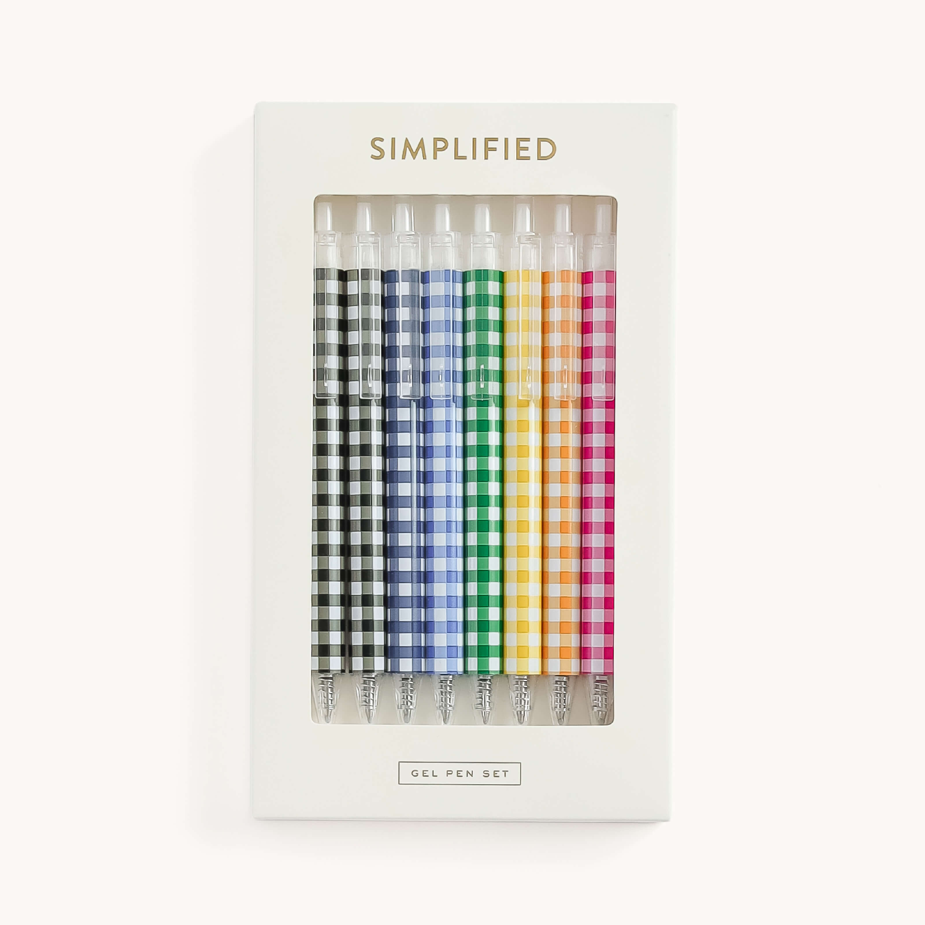 The Gel Pen Set - Gingham by Simplified is presented in a vertically arranged ivory box, featuring checkered pens in coordinating colors: black, blue, light blue, green, yellow, orange, pink, and purple. The top-opening box ensures easy access.
