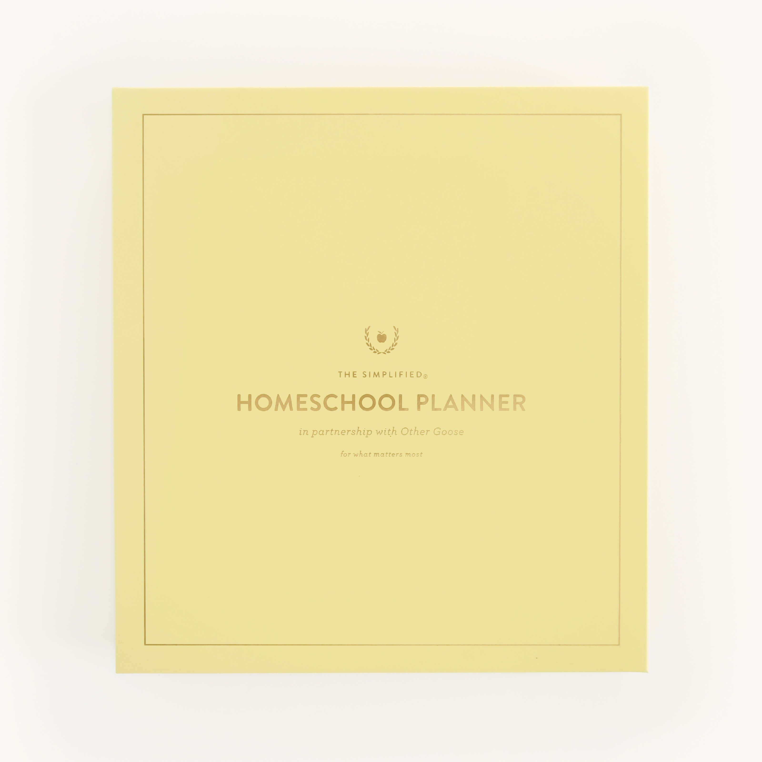 Yellow keepsake box for the Simplified Homeschool Planner by Emily Ley.