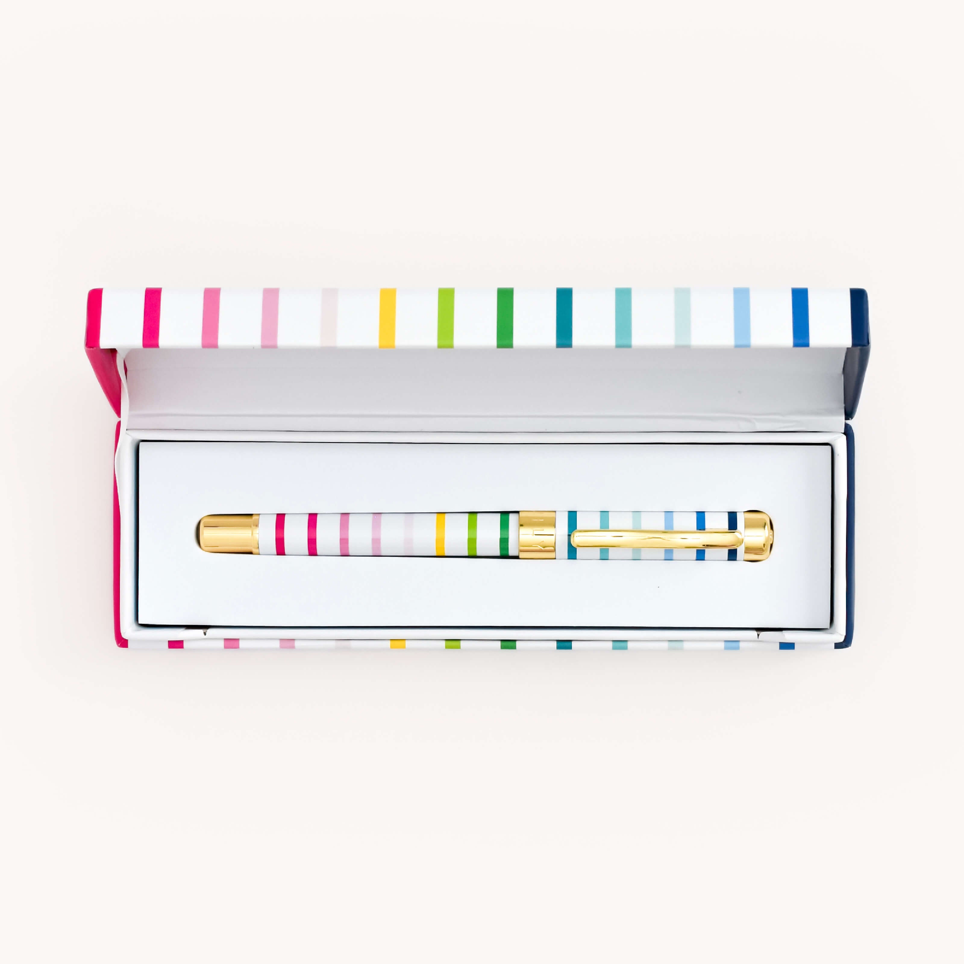 Simplified by Emily Ley | Gold metal pen in Happy Stripe design nested in a keepsake Happy Stripe box.