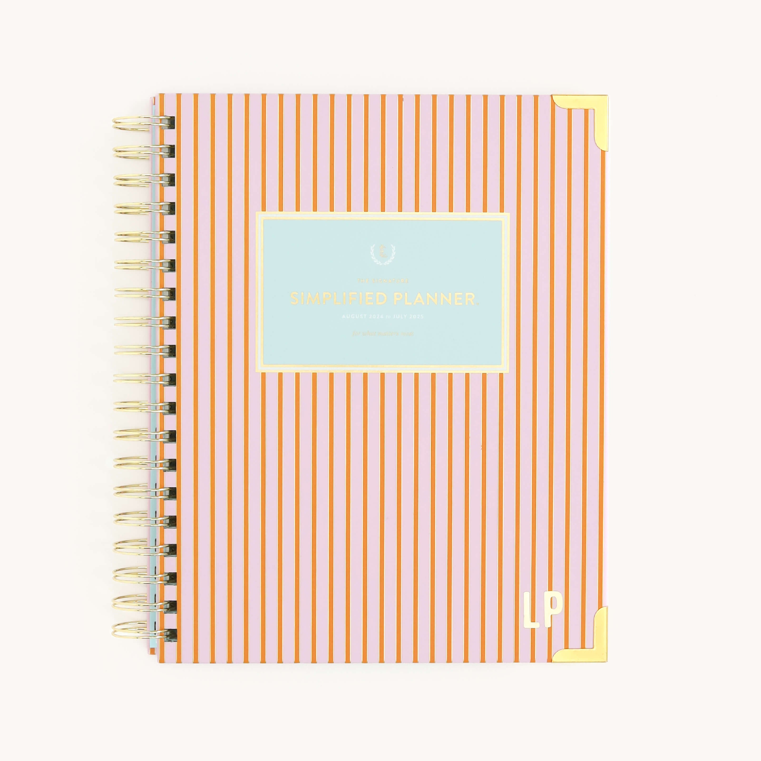 Modern Monogram Vinyl Sticker applied to a Cabana Pinstripe Simplified Planner cover.
