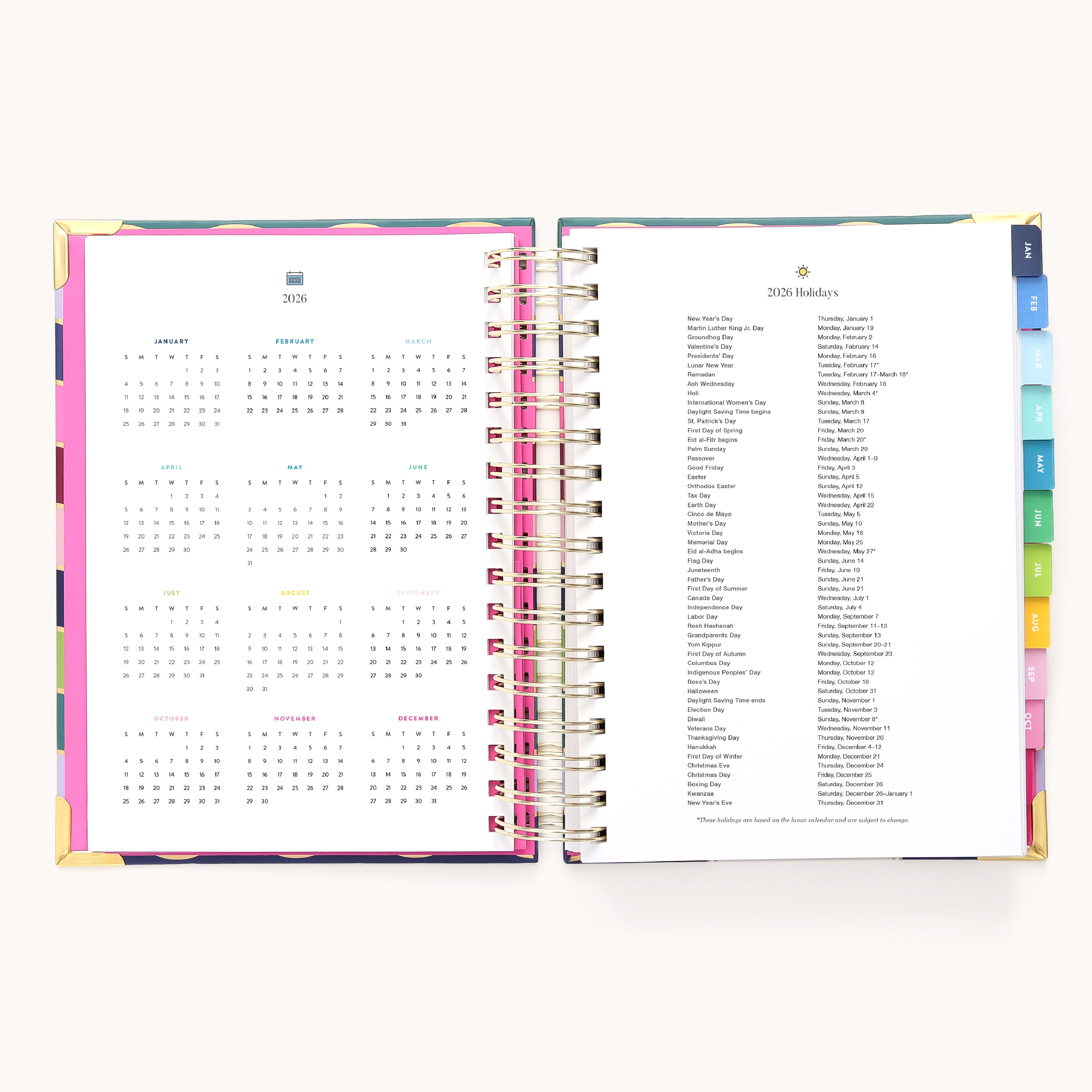 The 2026 Spiral Daily Simplified Planner - Rainbow Row by Simplified features a 12-month layout with a 2026 year-at-a-glance calendar on the left, holidays listed on the right, and colorful tab dividers for easy navigation.