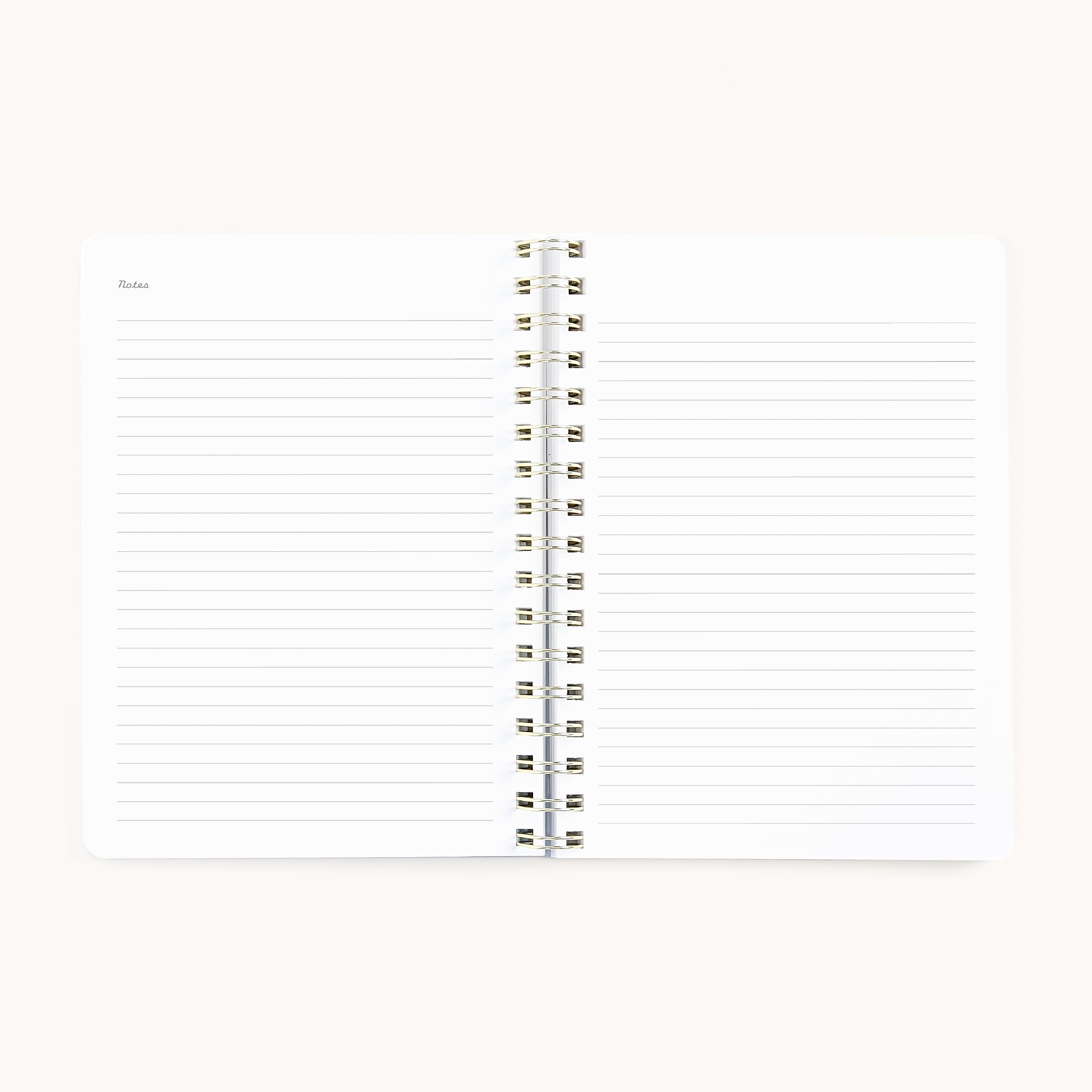 The 2026 Softcover Weekly Simplified Planner - Ivory Antelope by Simplified features lined white pages and “Notes” on the left page. Both pages are blank, perfect for planning or capturing daily ideas.