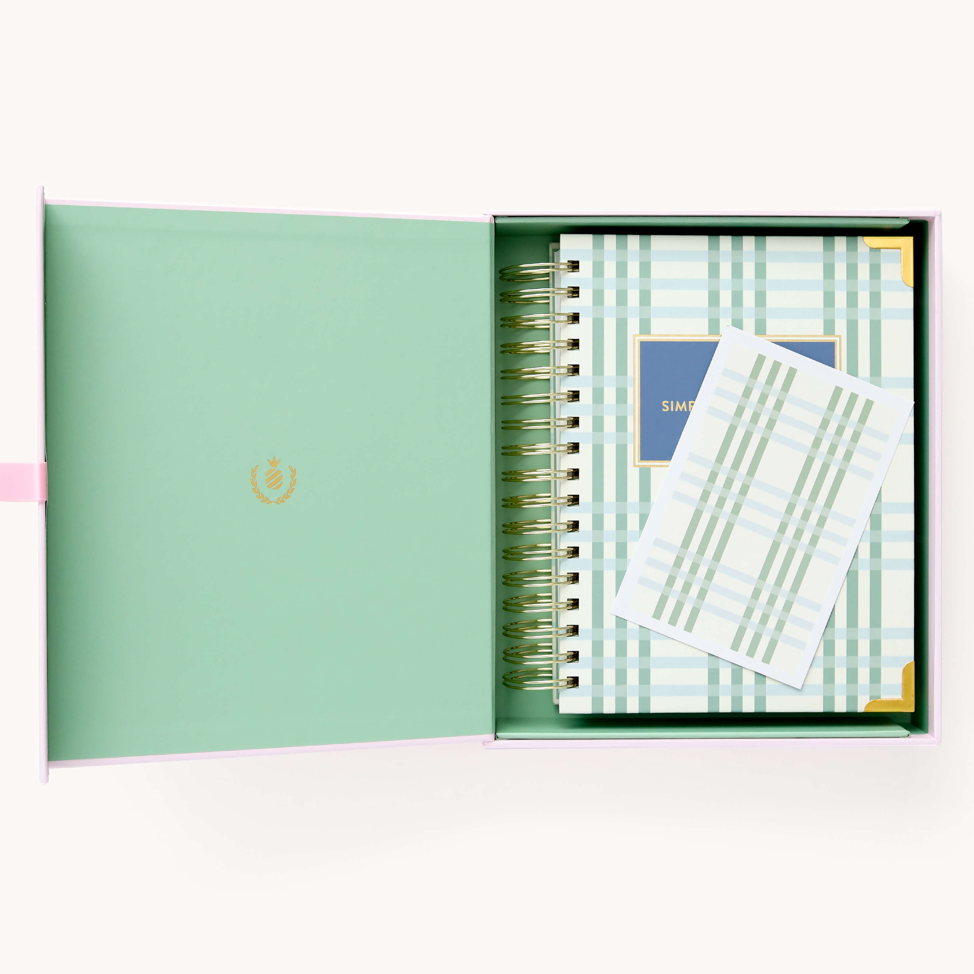 2025 Calendar Year Daily Simplified Planner by Emily Ley in the Pistachio Plaid cover design, placed inside a light blue and green keepsake box with gold foil detailing. Includes a matching art print for added inspiration. Perfect for organization, time management, and productivity.