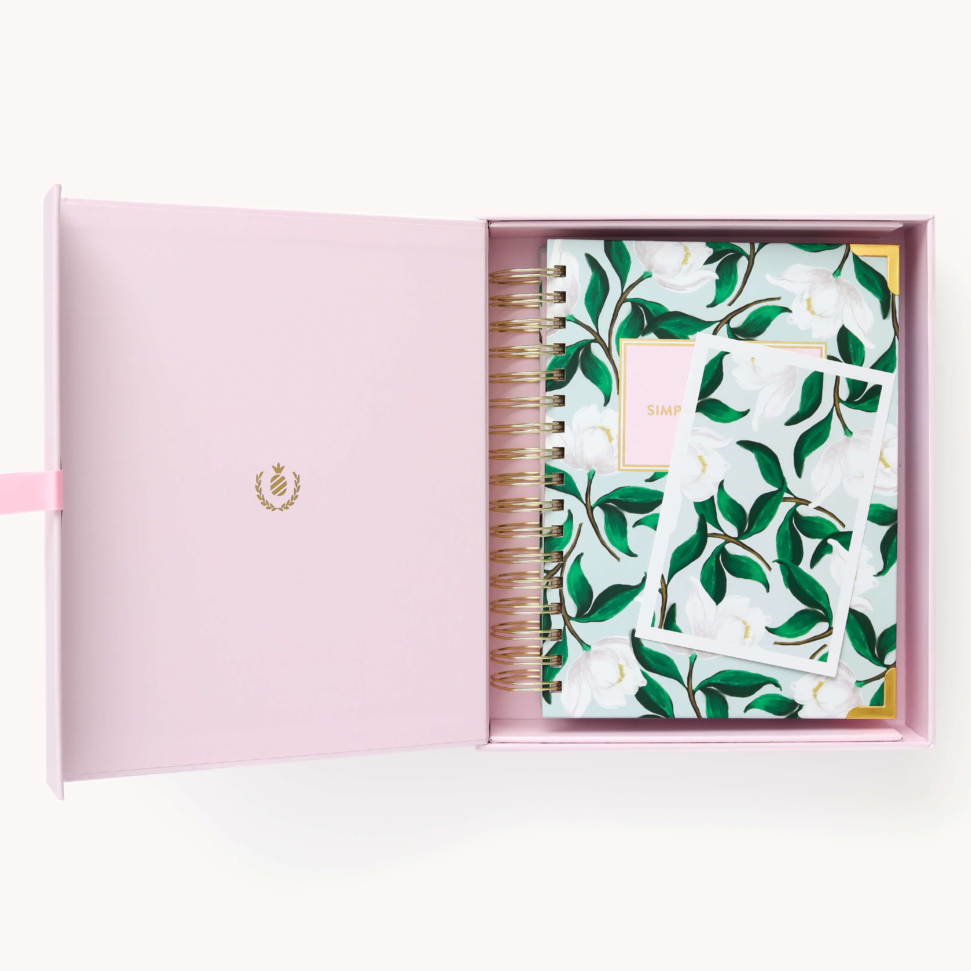 2025 Calendar Year Daily Simplified Planner by Emily Ley in the Savannah Blooms cover design, placed inside a blush keepsake box with gold foil detailing. Includes a matching art print for added inspiration. Perfect for organization, time management, and productivity.