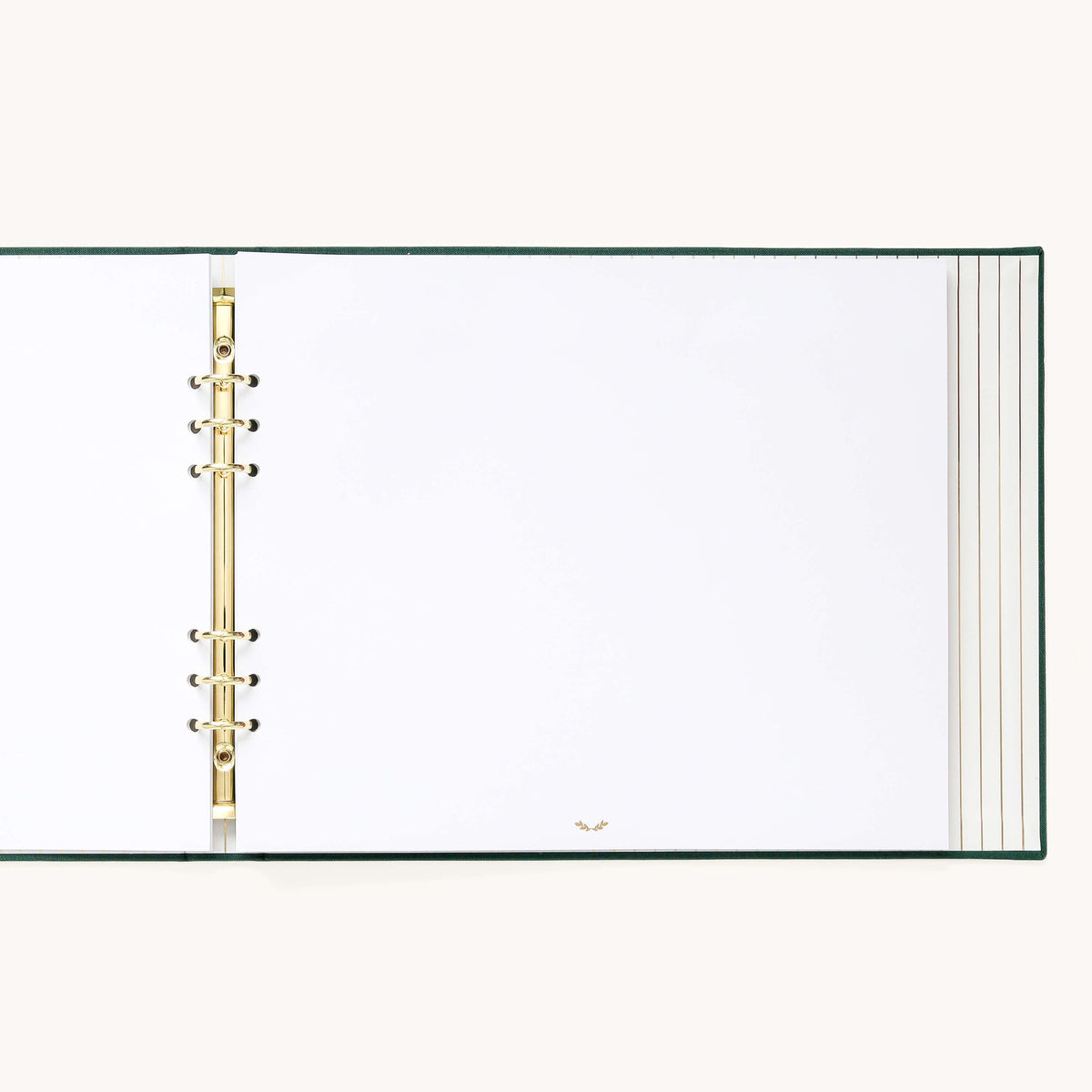 Evergreen Holiday Memories Book open to a blank white page on gold o-rings, ready for photos and holiday cards