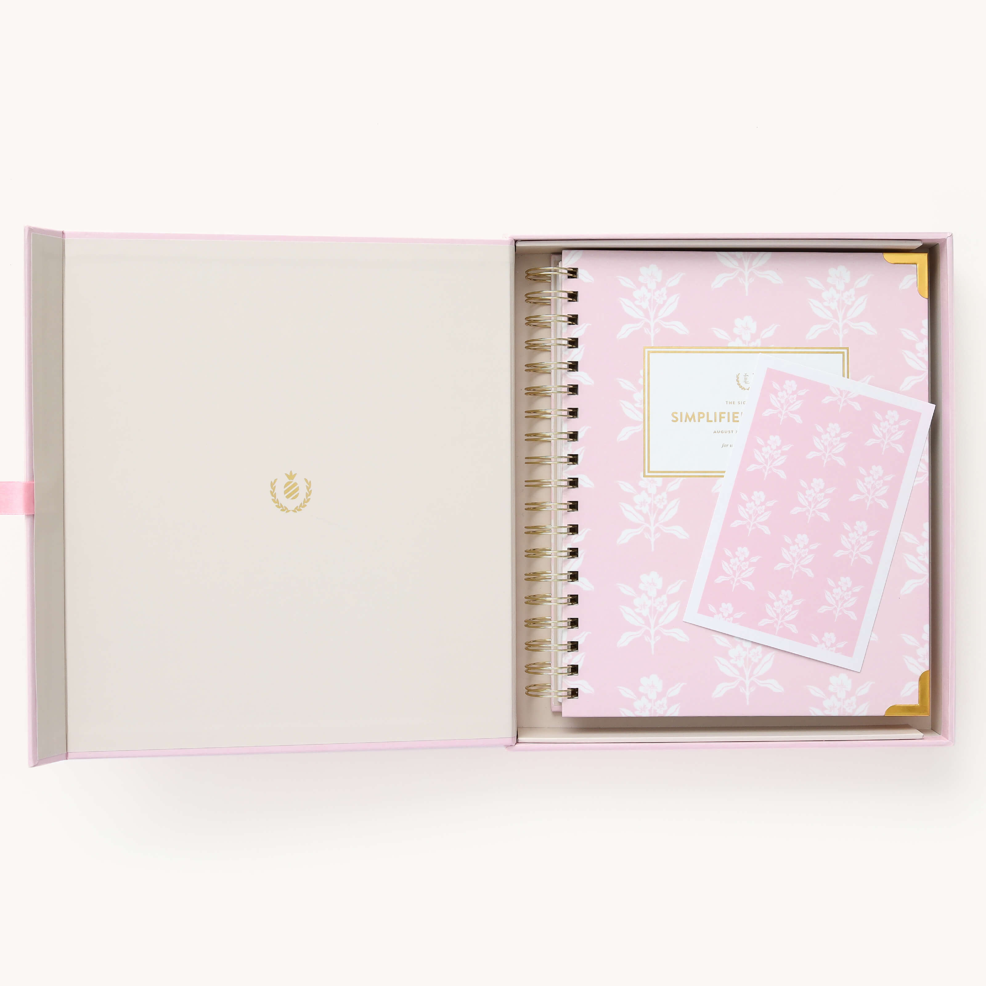 2025 Calendar Year Weekly Simplified Planner by Emily Ley in the Blush Block cover design, placed inside a blush pink keepsake box with gold foil detailing. Includes a matching art print for added inspiration. Perfect for organization, time management, and productivity.