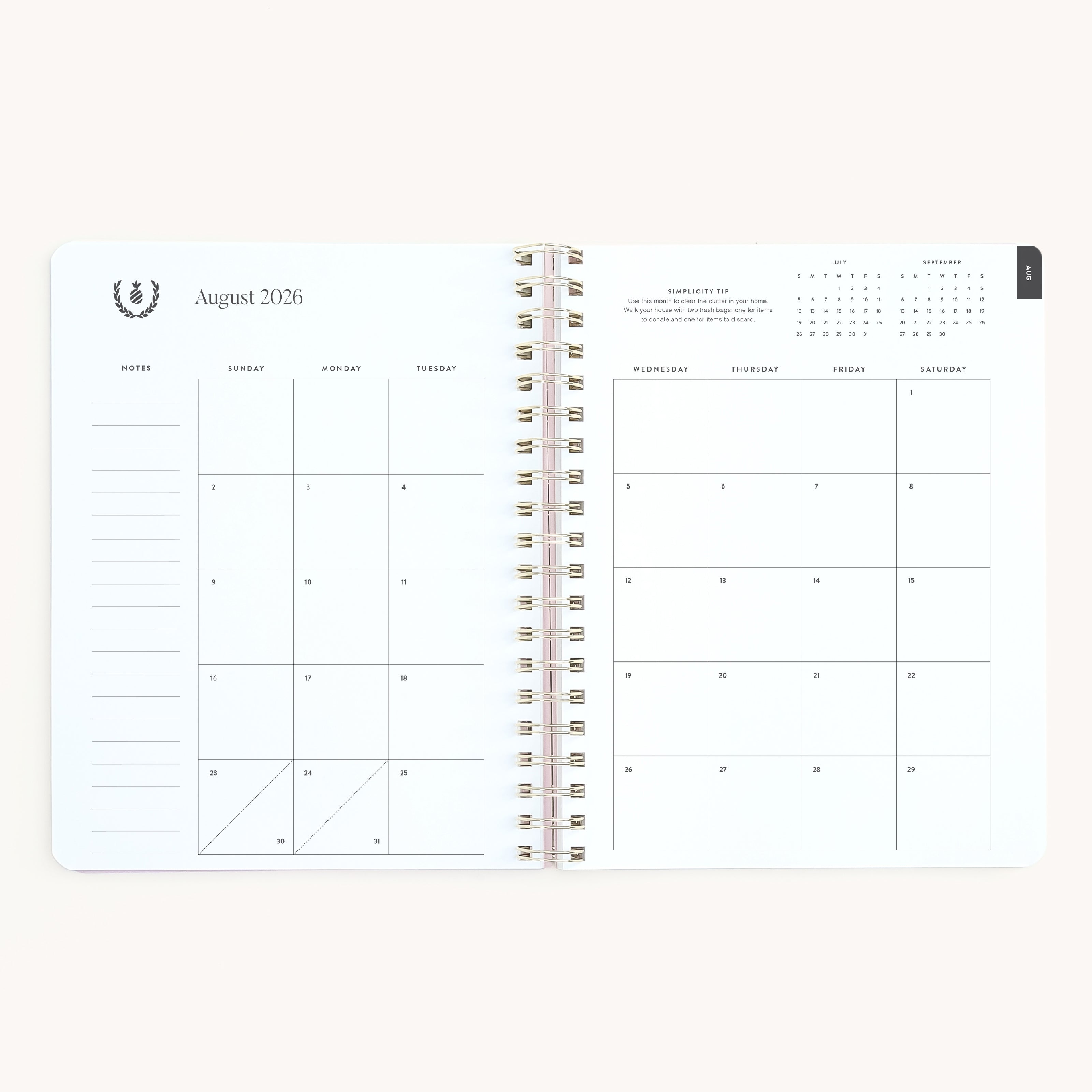 August monthly spread in large softcover weekly planner with clean calendar layout for planning ahead