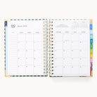 The 2026 Spiral Daily Simplified Planner - Camp Gingham by Simplified displays January 2026 in a neat grid, with colorful side tabs and a notes section—ideal for perfect organization in your 2026 planner.