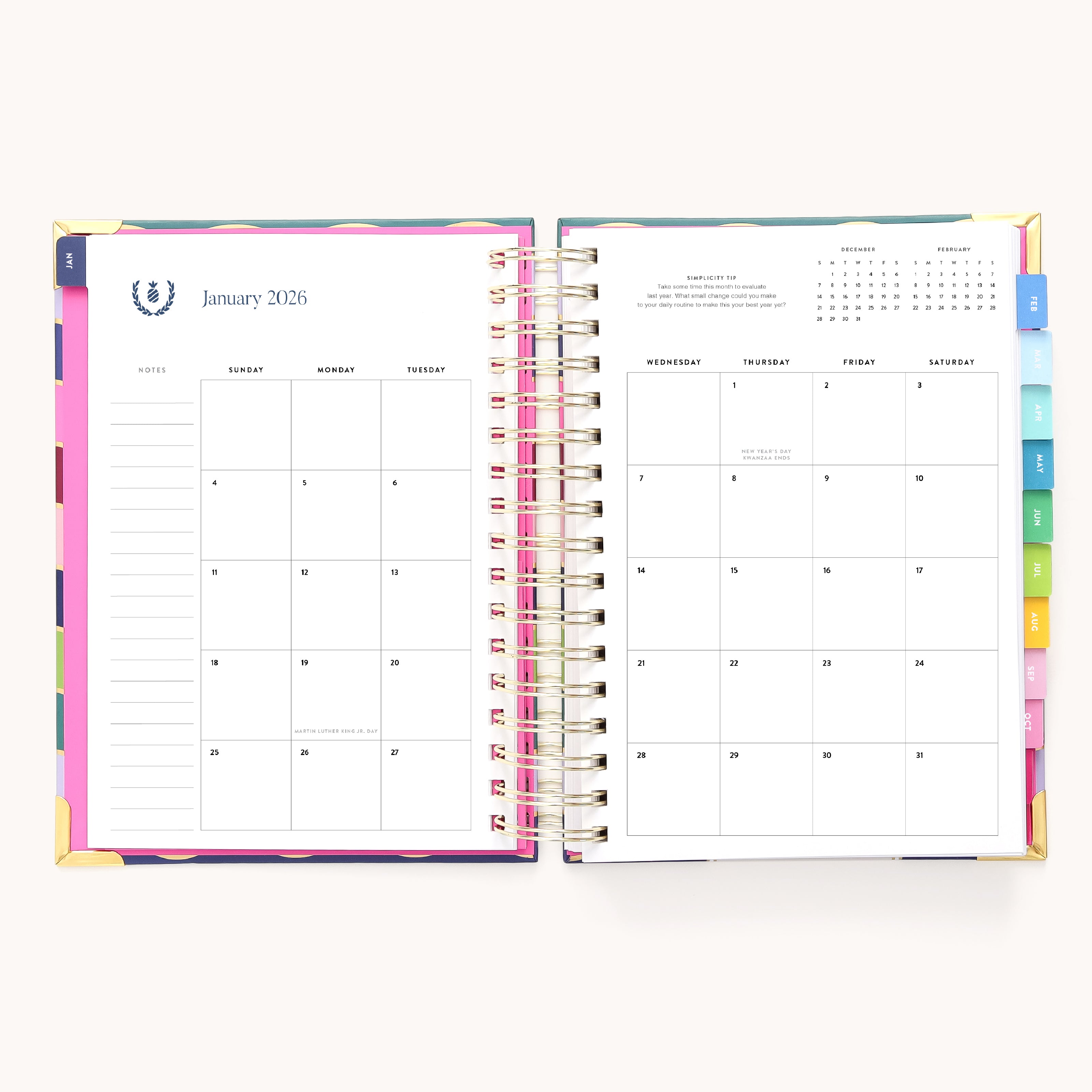 The 2026 Spiral Daily Simplified Planner - Rainbow Row by Simplified features a January 2026 monthly view on the left, colorful tabbed calendars for each month on the right, spiral binding, and vibrant edge designs.