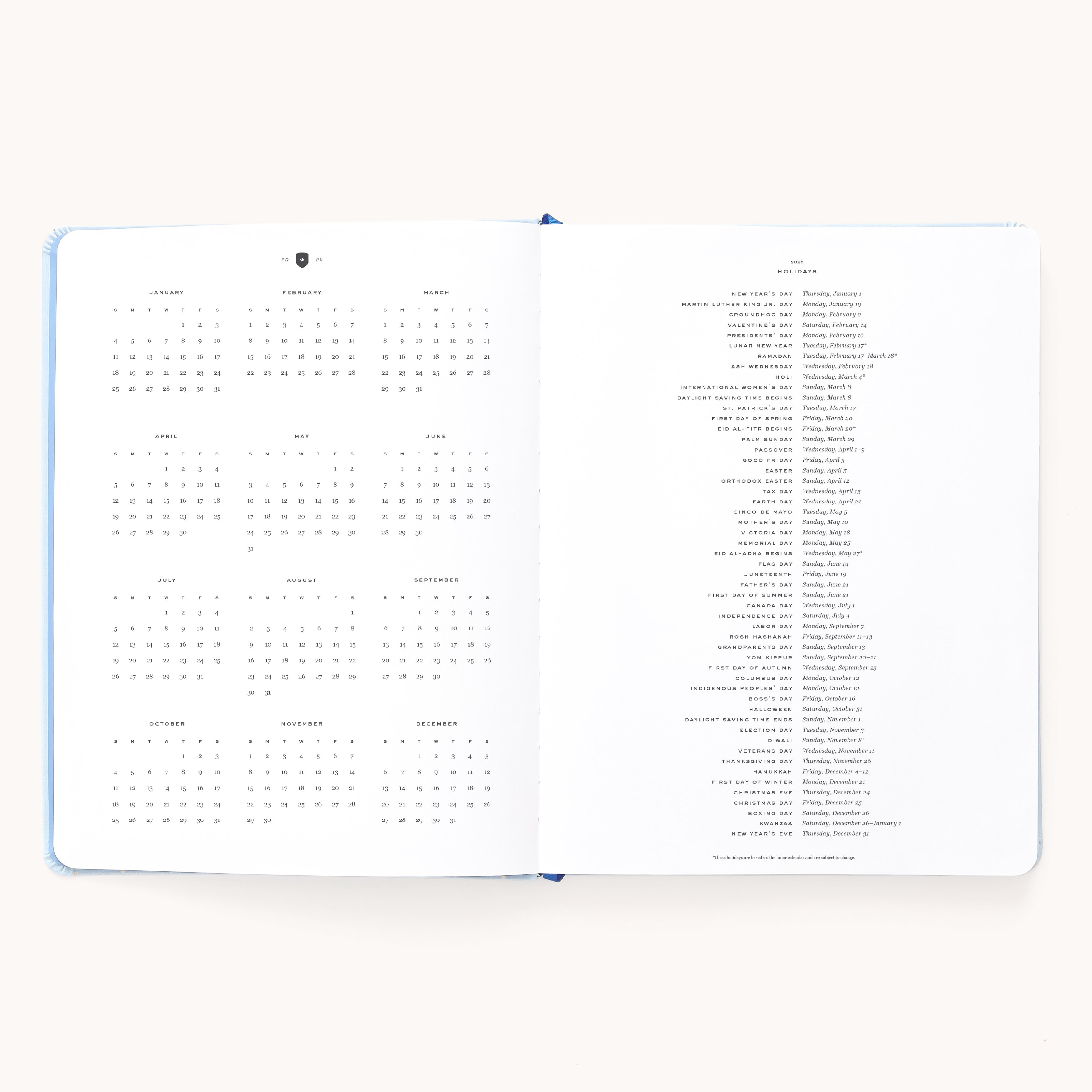 The 2026 Bookbound Weekly Dapperdesk Planner - Carolina Dot by Simplified features a yearly calendar, holidays, clean minimal pages, and a stylish leatherette cover—perfect for staying organized all year.