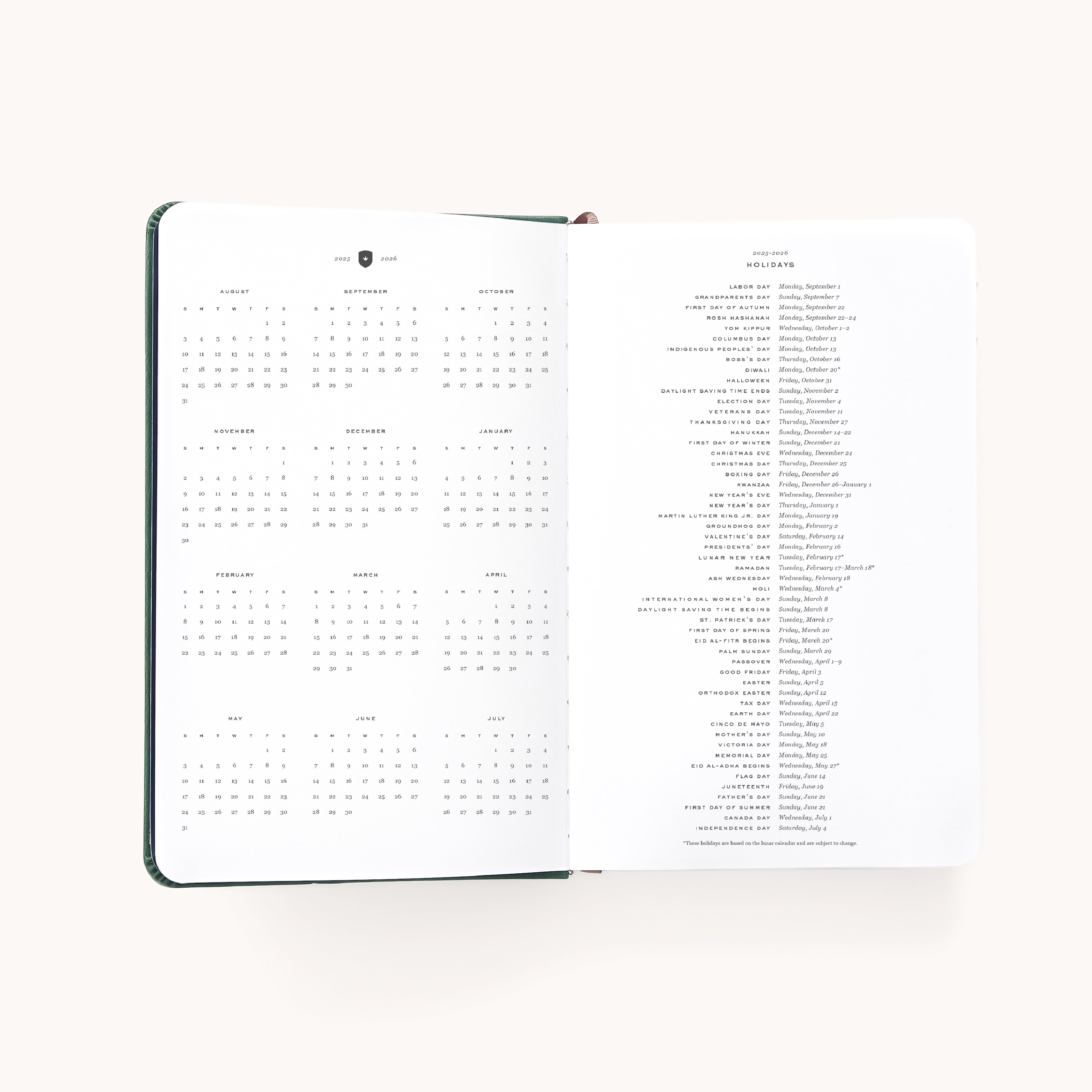 The 2025-2026 Bookbound Daily Dapperdesk Planner - Evergreen by Simplified features a yearly calendar grid on the left page and detailed descriptions of holidays and notable dates on the right. Its pristine white background enhances its clean design, ideal for daily planning enthusiasts.