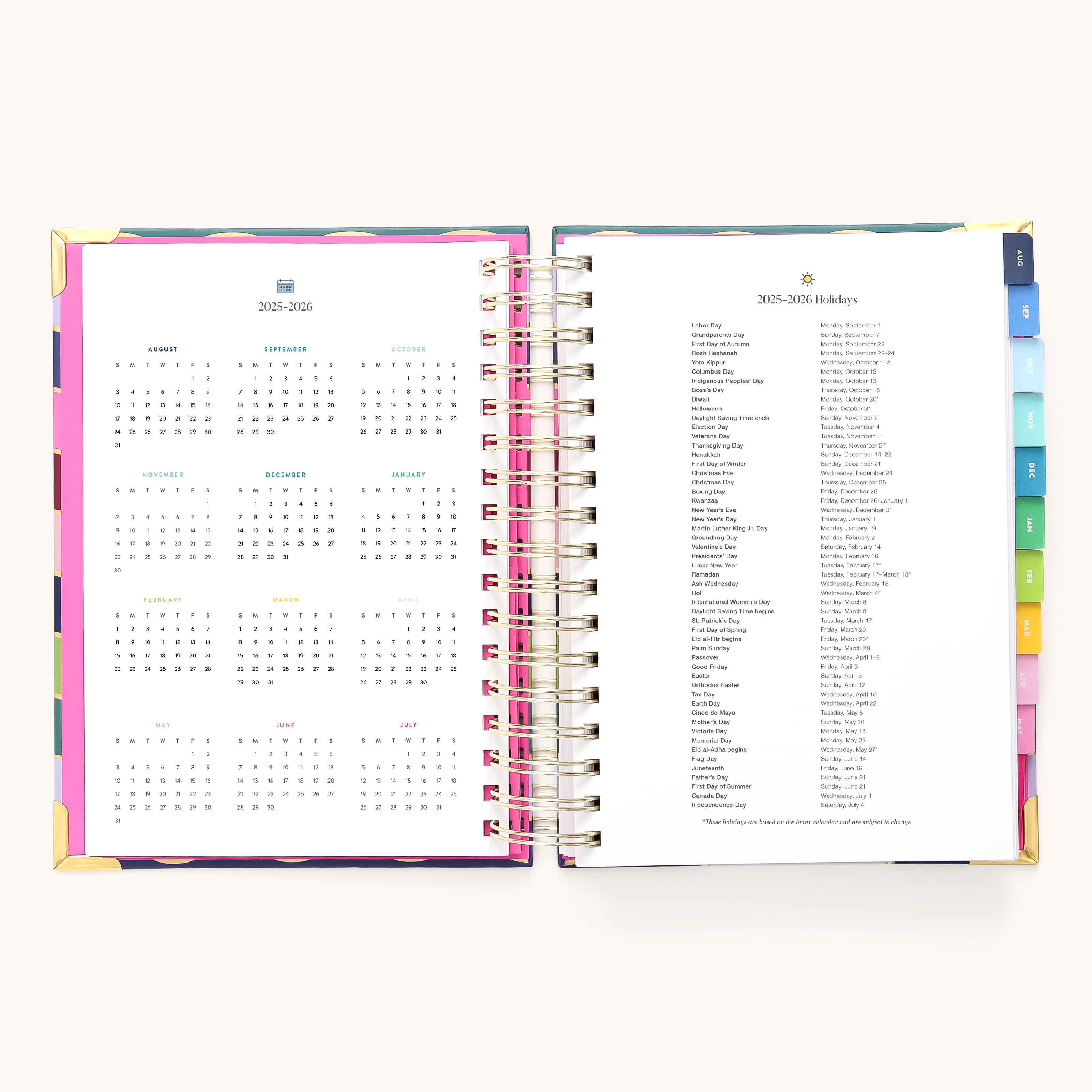 The 2025-2026 Spiral Daily Simplified Planner by Simplified is open showing a calendar on the left and holidays on the right. It features colorful tabbed dividers, gold foil details, is spiral-bound, and displayed against a plain background.