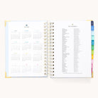 The 2025-2026 Spiral Daily Simplified Planner - Serene Stripe by Simplified features a calendar and holiday list, enhanced with gold foil details and tabbed sections for elegance, while the Simplified Prep Work keeps you organized all year.