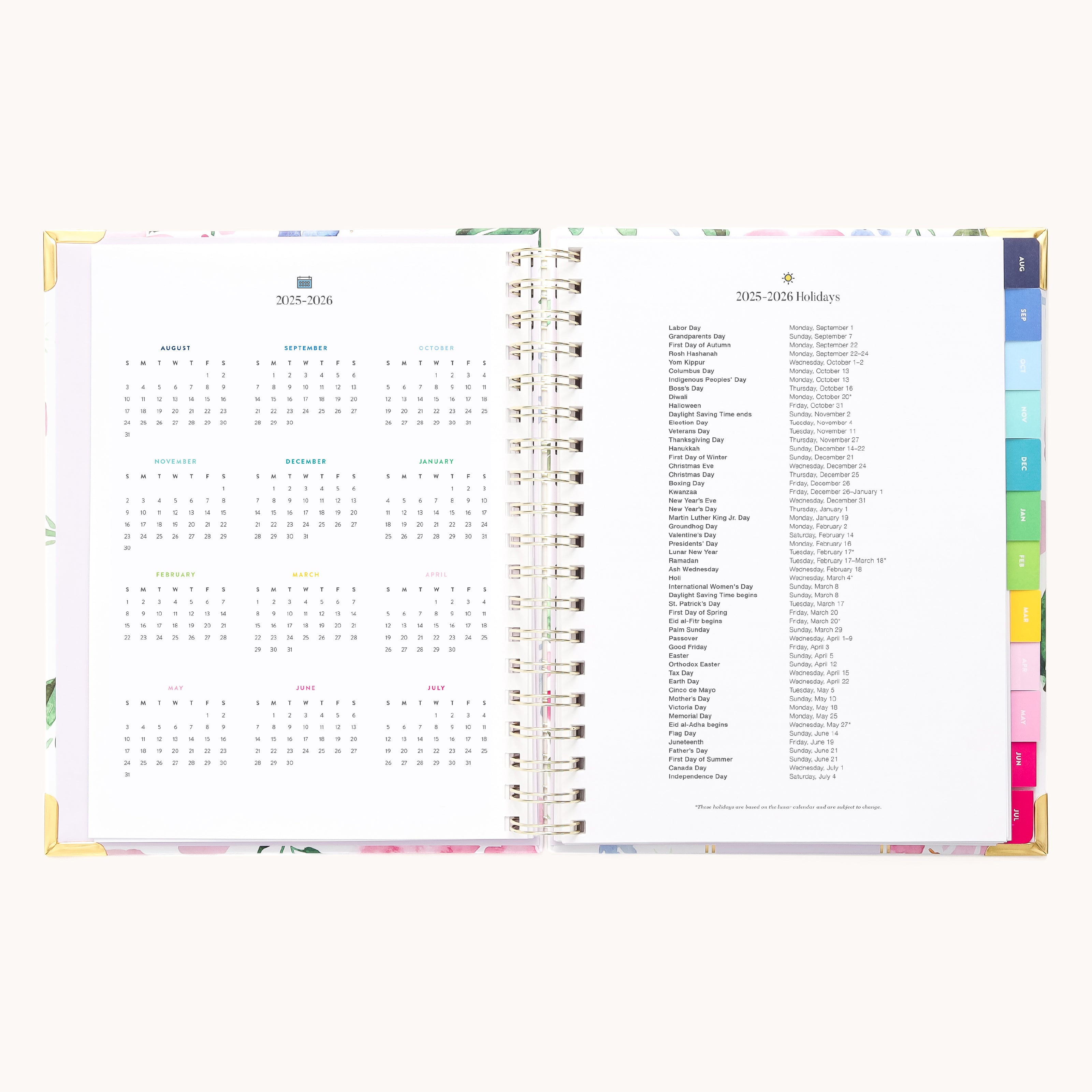The Simplified 2025-2026 Spiral Weekly Planner in Cottage Floral presents a left-side calendar and right-side holiday list. It boasts vibrant tabbed sections, floral borders, and gold foil details for an elegant touch.
