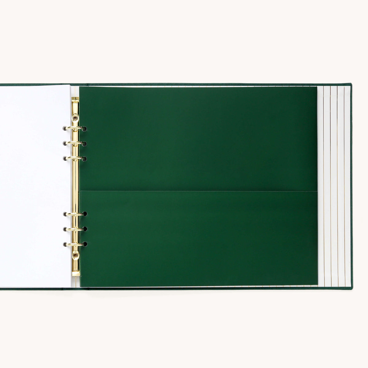 Evergreen Holiday Memories Book open to a green double-sided pocket page for holiday cards on a gold o-ring binder