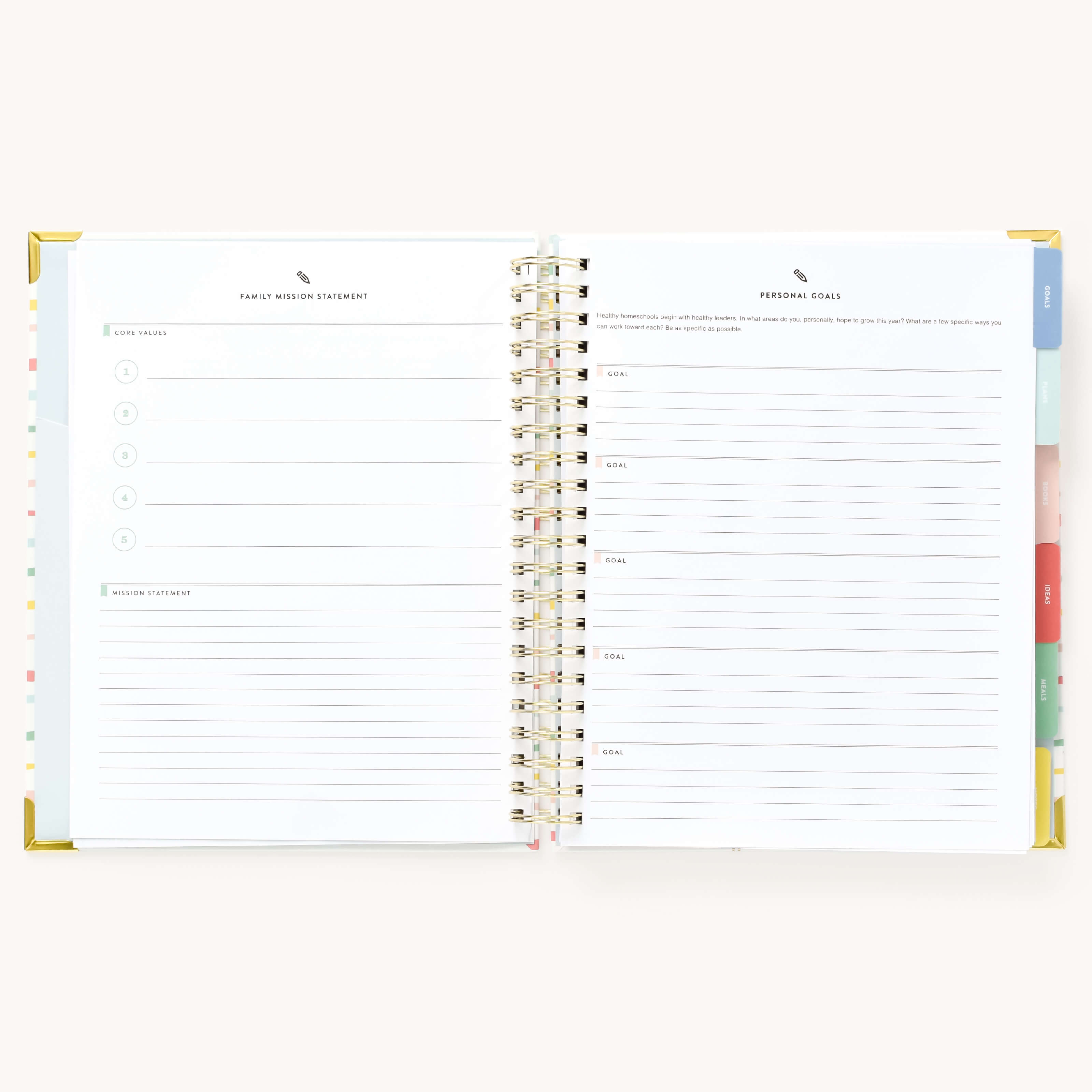 Simplified Planner by Emily Ley open to the Family Mission Statement and Personal Goals pages. The left page provides structured sections for defining core values and crafting a mission statement, while the right page offers dedicated space for setting and tracking personal goals.