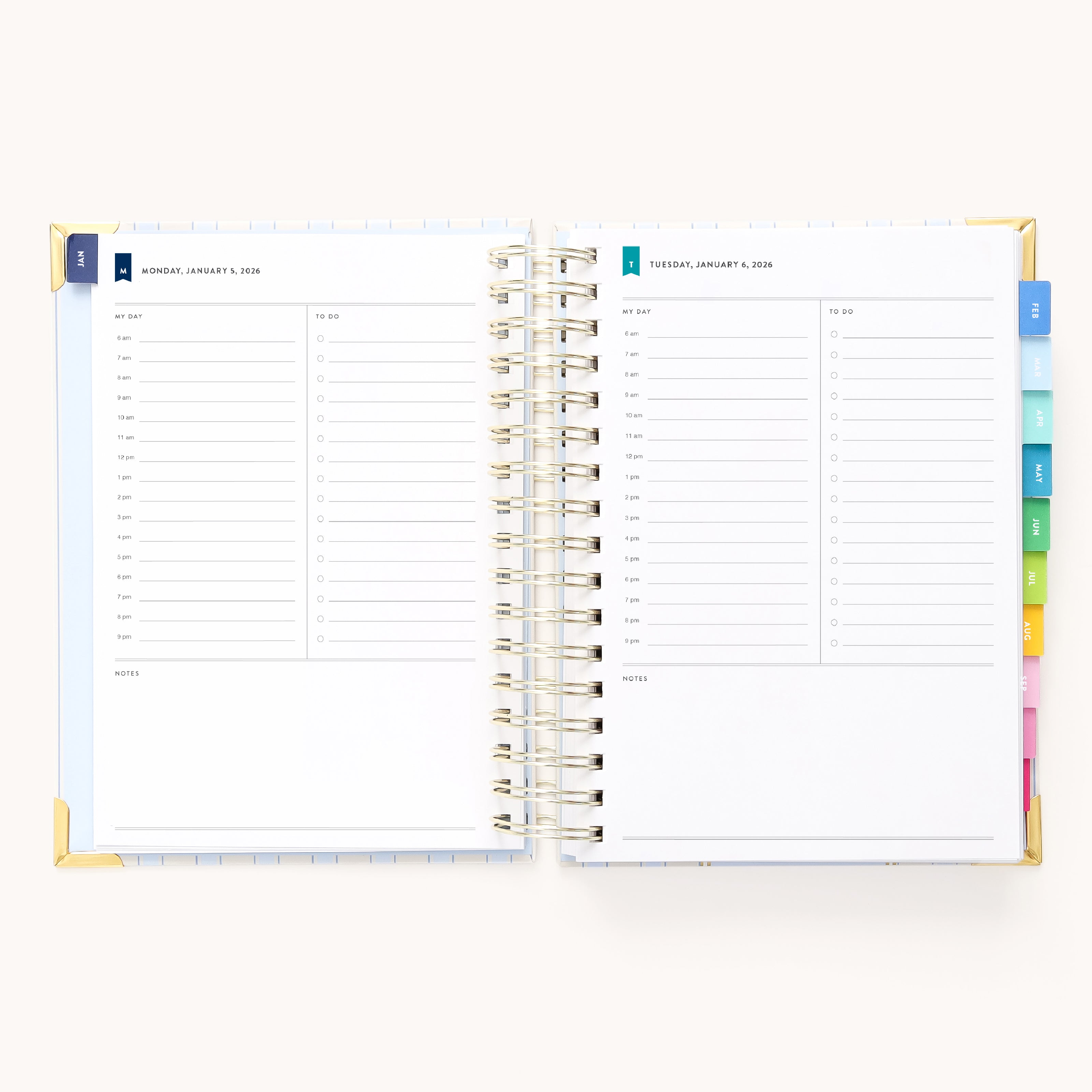 The 2026 Spiral Daily Simplified Planner - Serene Stripe by Simplified features an open spiral layout with two days per spread, hourly lined sections from 7 AM to 8 PM, note space, and colored tab dividers on the right.