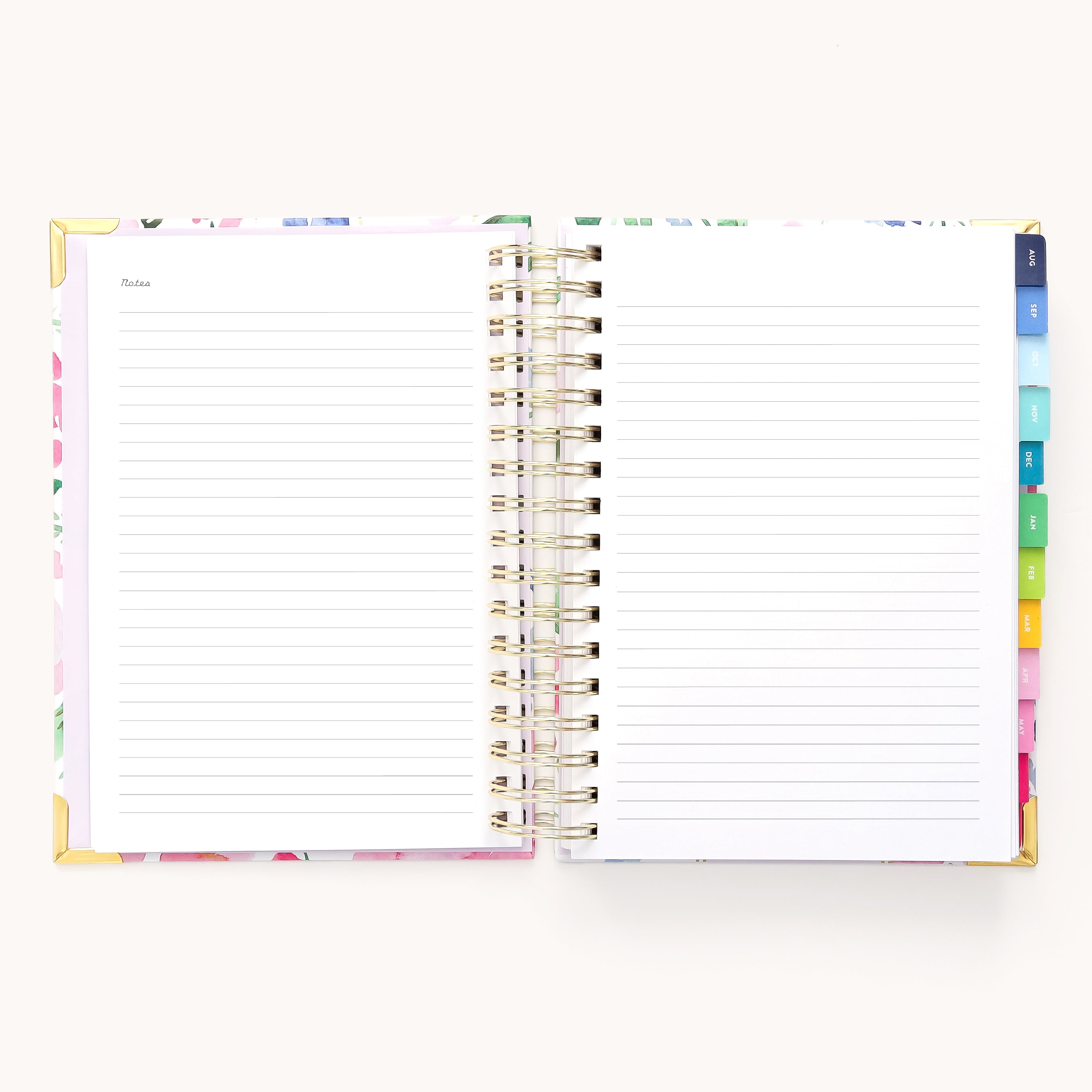 The 2025-2026 Spiral Daily Simplified Planner by Simplified features a Cottage Floral cover with gold foil accents, colorful section dividers on the right, and lined pages titled Notes at the top left, perfectly complementing any planner collection.