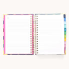 The 2025-2026 Spiral Daily Simplified Planner by Simplified features a vibrant rainbow pattern cover with gold foil accents, colorful tabs on the right, and lined pages labeled Notes on the left. Ideal for simplification in prep work.