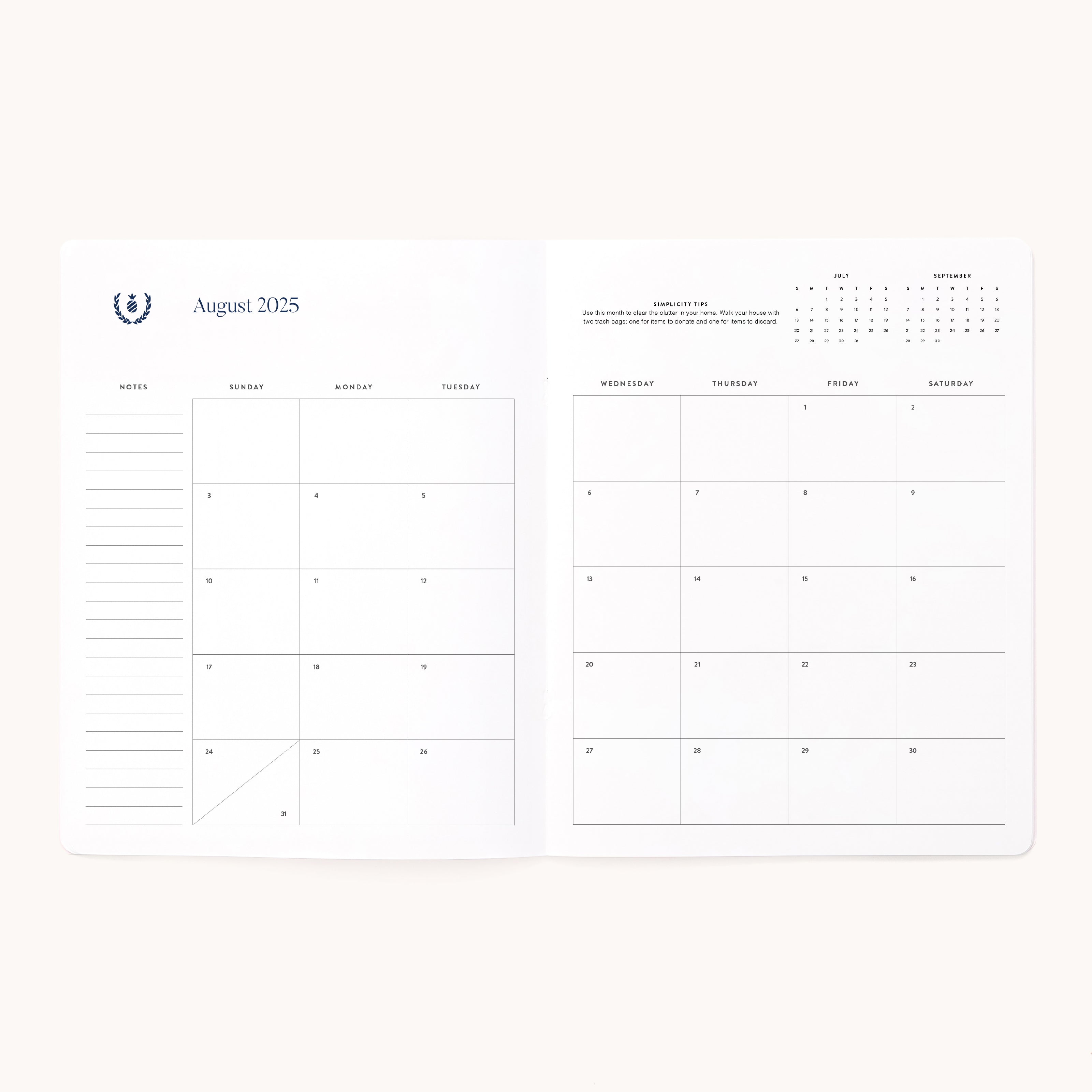 The 2025-2026 Softcover Monthly Simplified Planner - Happy Stripe by Simplified features a calendar for August 2025. It includes a Sunday-to-Saturday grid layout with note spaces on the left page and a small yearly calendar in the top right corner, perfect for seamless planning and organization.