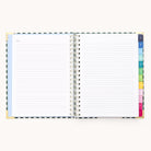 The 2025-2026 Spiral Weekly Simplified Planner - Camp Gingham by Simplified features a geometric pattern cover with gold foil details, colorful tabs on each pages right edge, and Notes at the top of the left page. Ideal for fans of the Simplified Planner aesthetic.