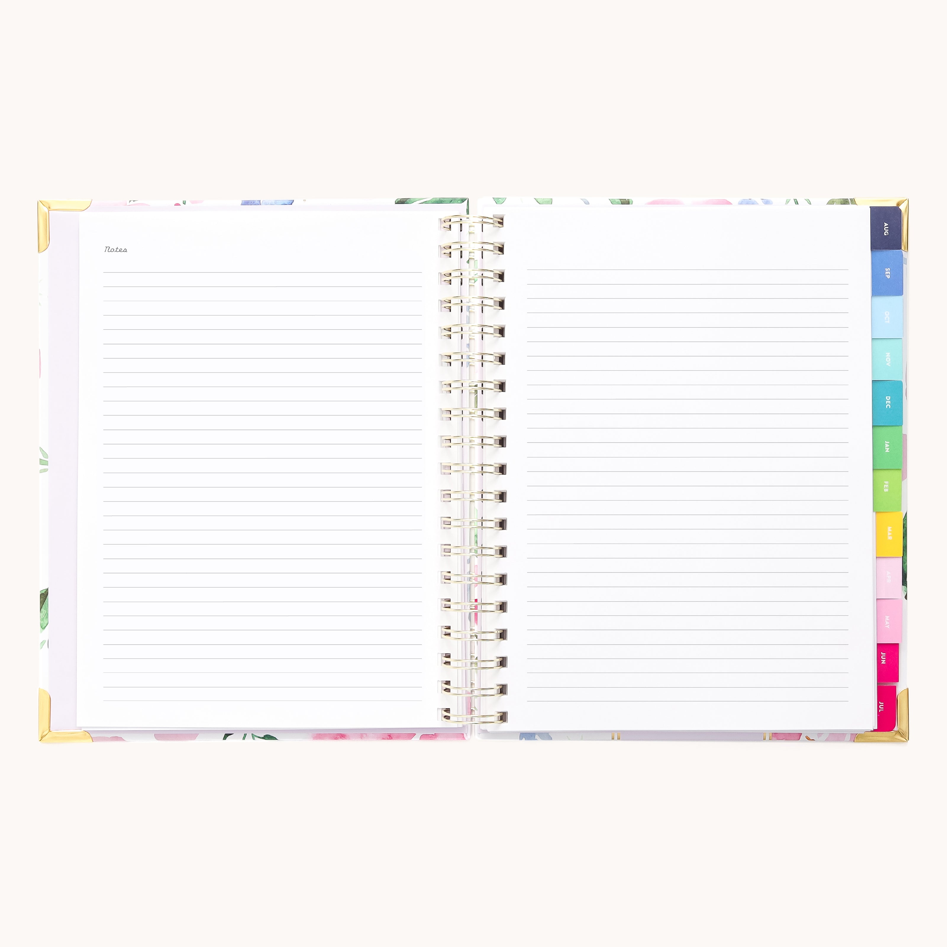 The 2025-2026 Spiral Weekly Simplified Planner by Simplified features lined, tabbed pages with eye-catching gold foil details. The left page is titled Notes, while the cover is adorned with a Cottage Floral pattern, making organization effortless.