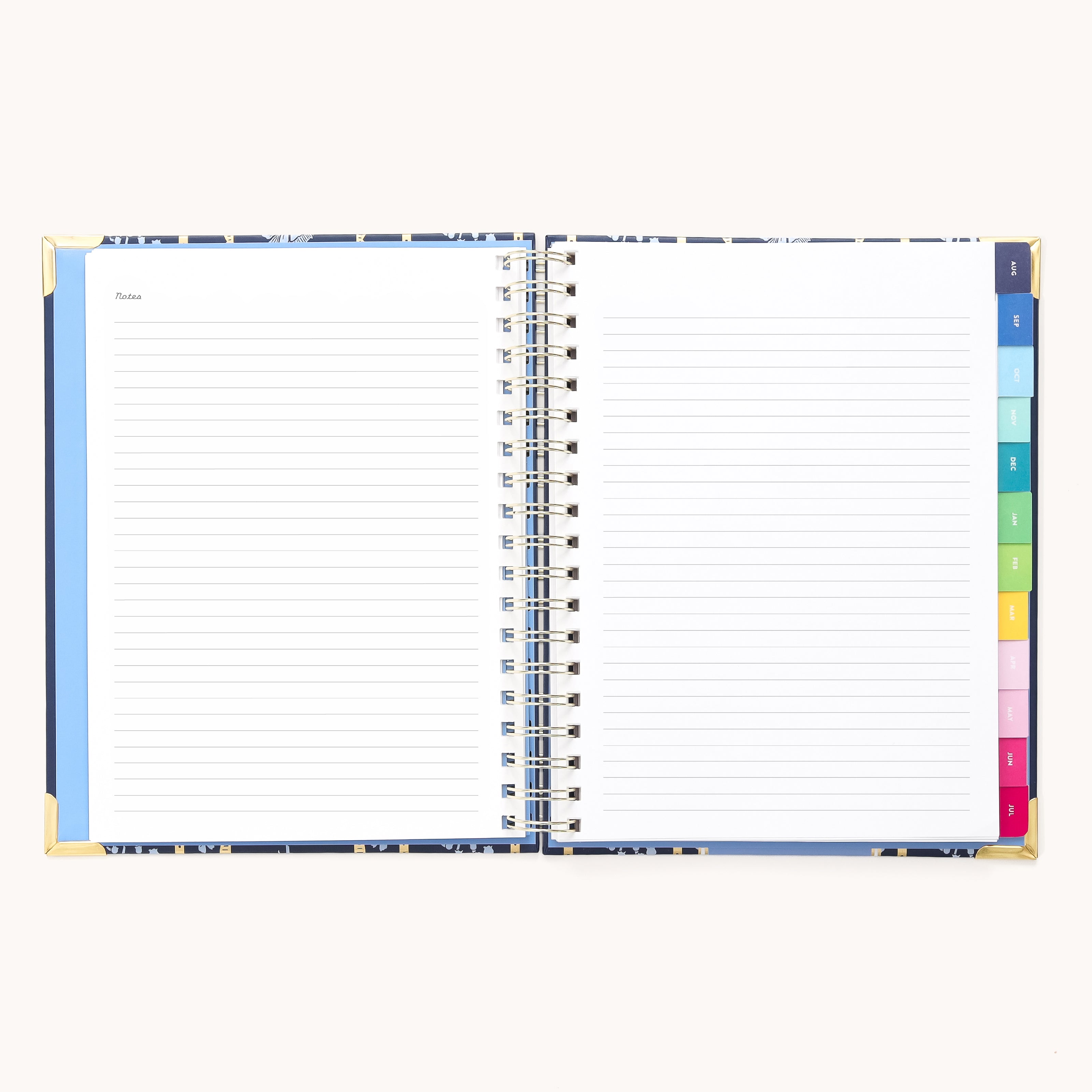 The 2025-2026 Spiral Weekly Simplified Planner - Poppy Posies by Simplified features lined pages with colorful tab dividers, neatly labeled sections, and reinforced metal corner protectors, offering a streamlined design for simplified task prep.