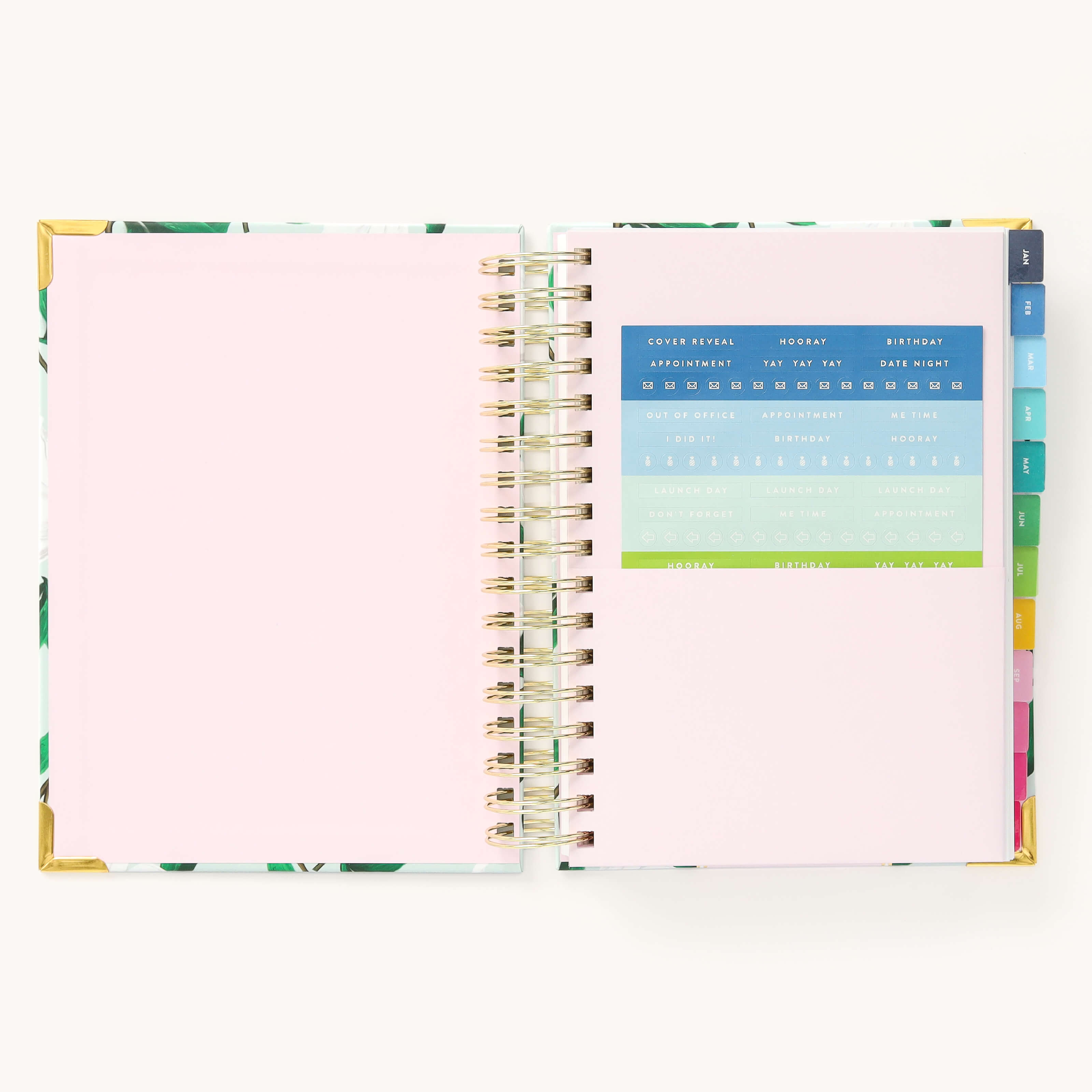 2025 Daily Simplified Planner by Emily Ley in the Savannah Blooms cover design open to the yearly calendar overview and holidays list. Features a two-page spread with a full 12-month calendar view on the left and important U.S. holidays on the right.
