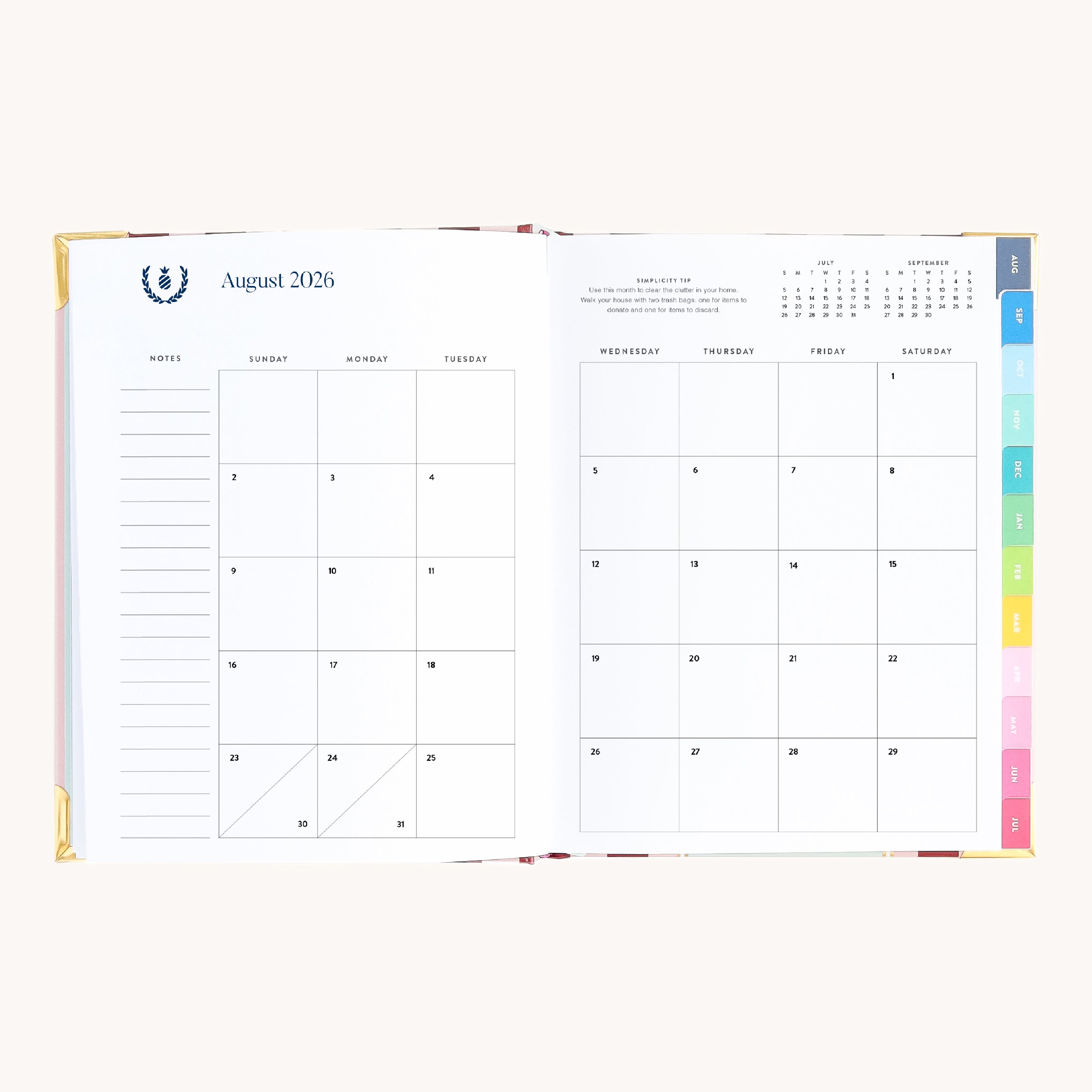 August monthly spread in bookbound weekly planner with calendar grid for planning goals, events, and routines