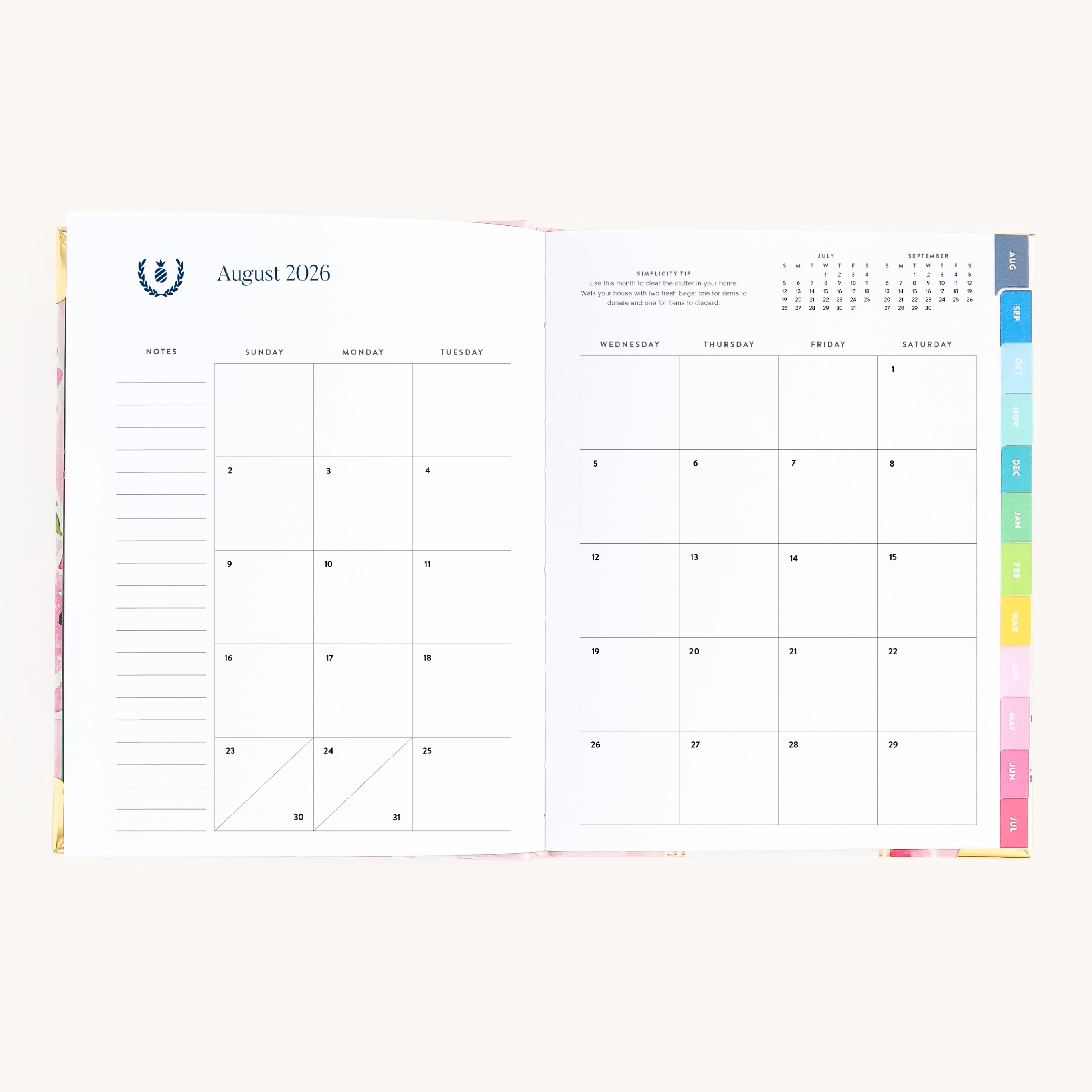 August monthly spread in bookbound weekly planner with calendar grid for planning goals, events, and routines