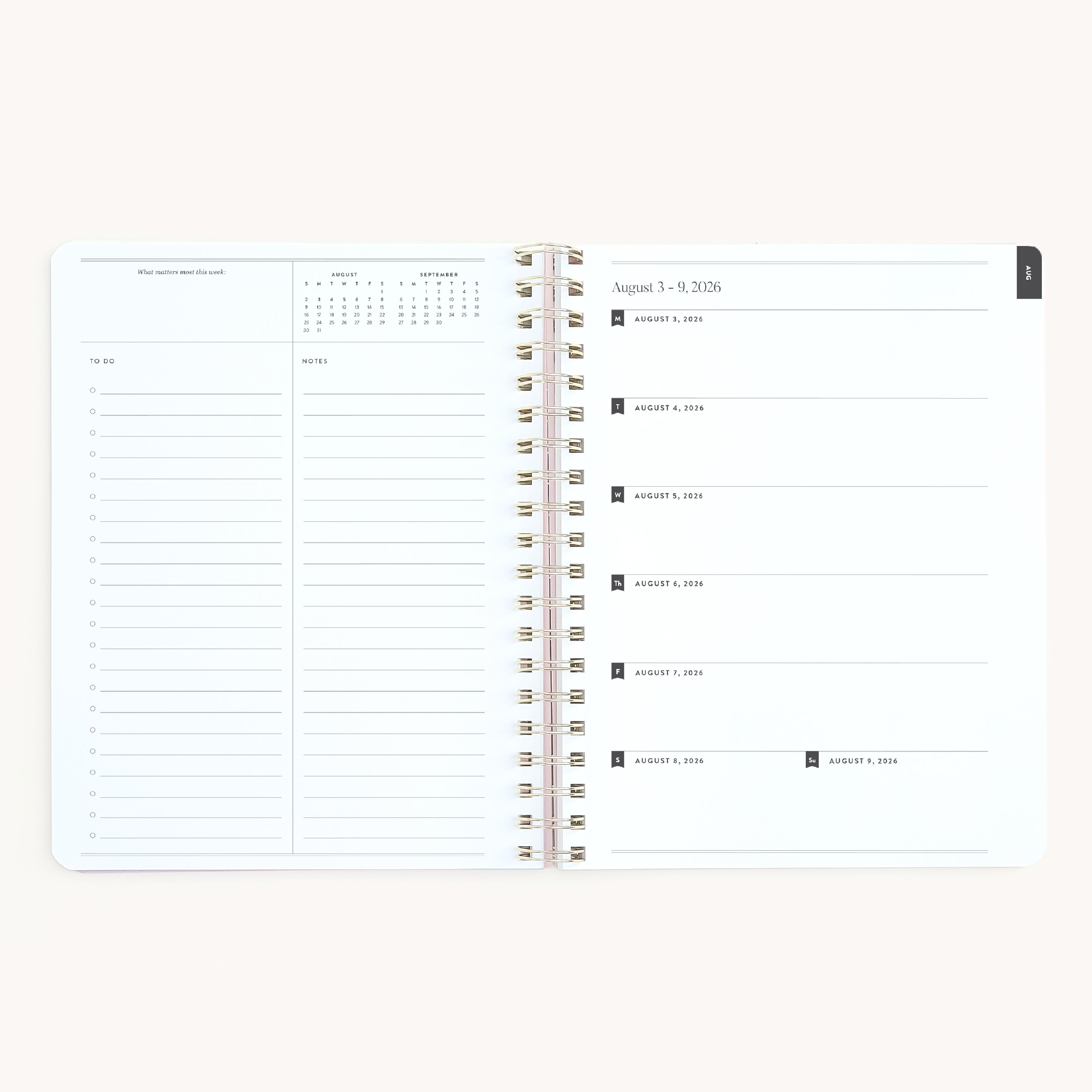 Large softcover weekly planner spread with horizontal weekly layout, space for daily plans, to-do lists, and notes in a clean, minimal design