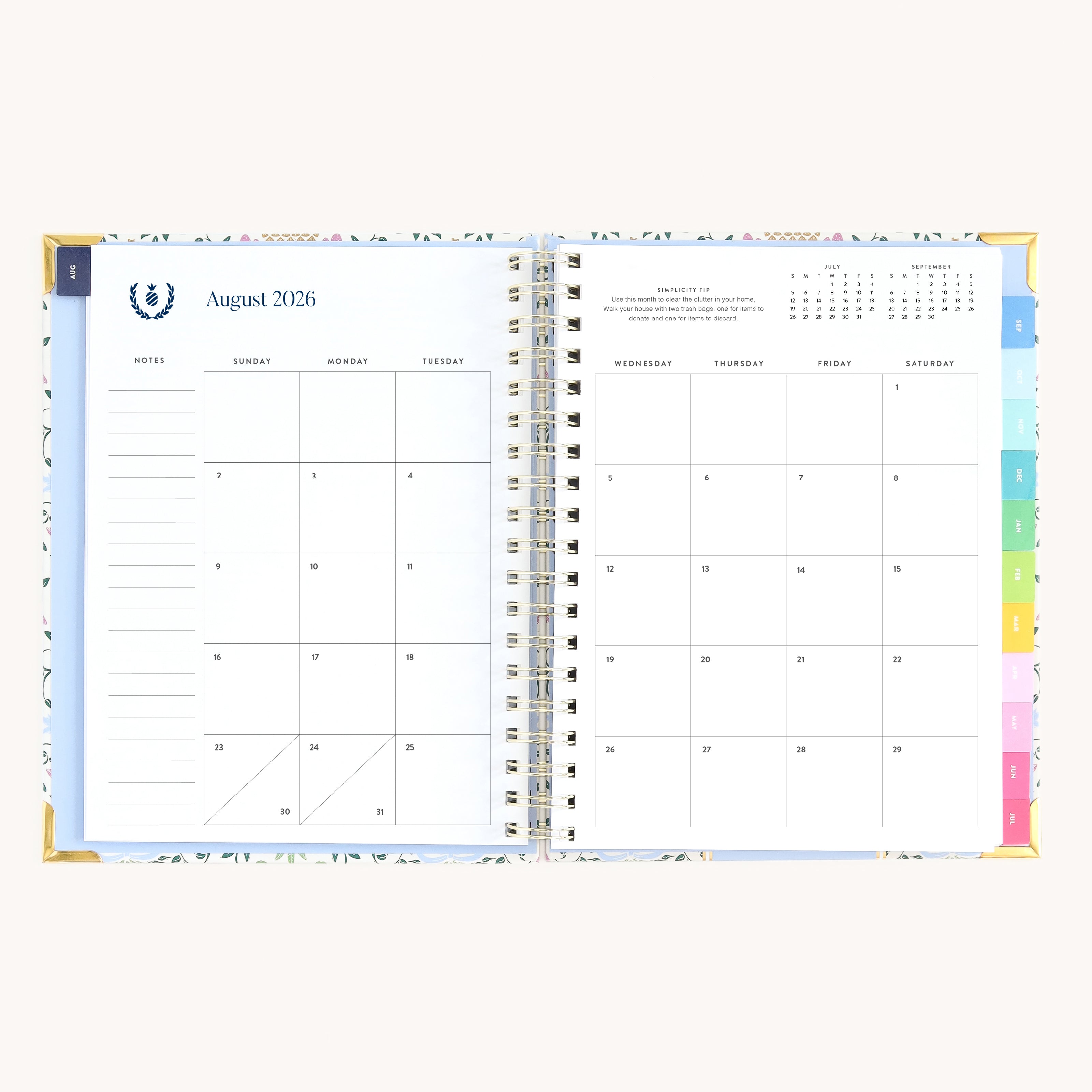 August monthly calendar spread in spiral weekly planner with clean layout for scheduling and goal setting