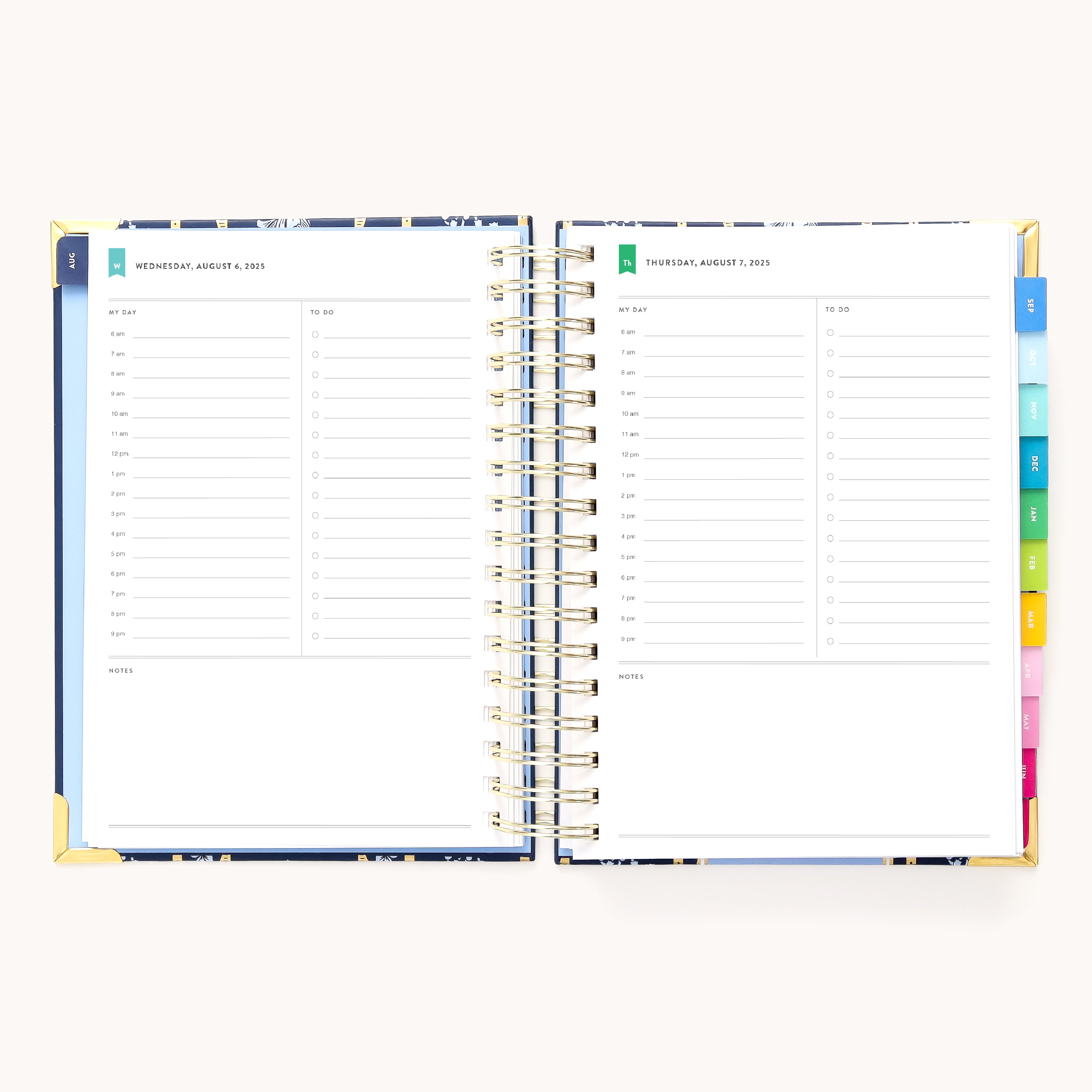The 2025-2026 Spiral Daily Simplified Planner by Simplified, featuring gold foil and colorful tabbed dividers, is open to Wednesday, August 9, and Thursday, August 10, 2023. Each page offers hourly slots from 7 AM to 7 PM and includes a notes section below.