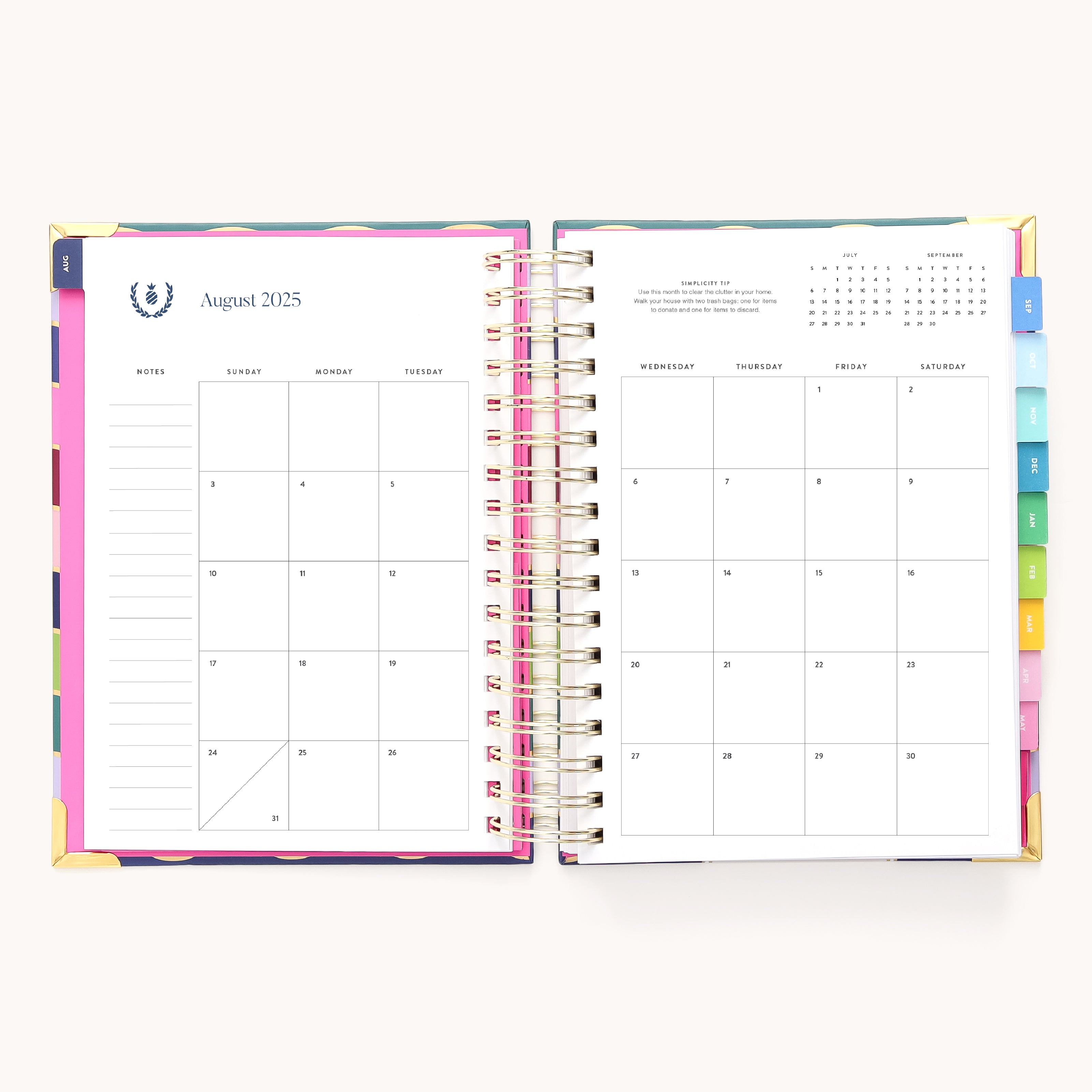 The 2025-2026 Spiral Daily Simplified Planner - Rainbow Row by Simplified opens to the August 2025 calendar, featuring note space on the left with days listed from Friday to Tuesday, and a grid on the right for Wednesday to Saturday. Gold foil details embellish its monthly tabs along the side.