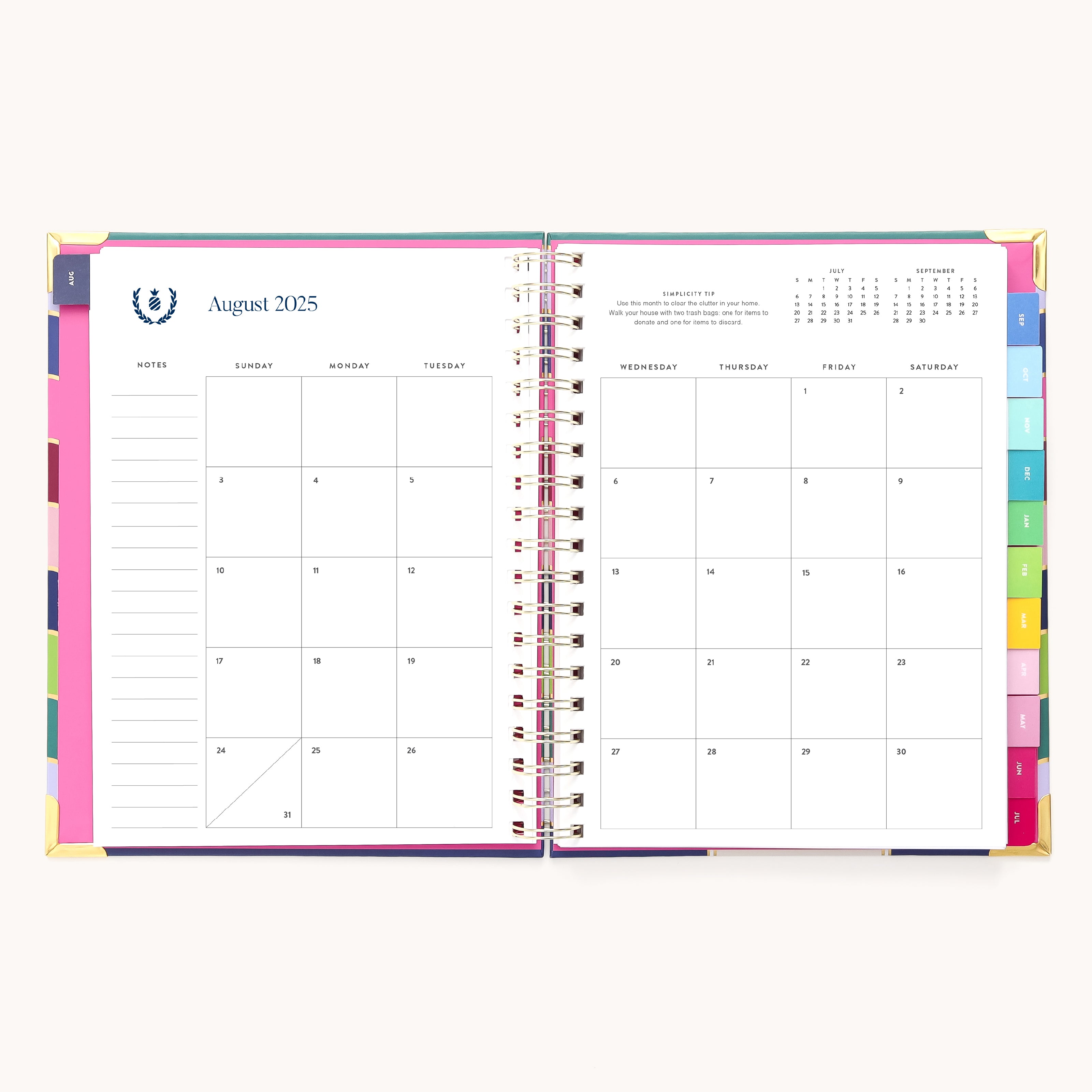 Open the 2025-2026 Spiral Weekly Simplified Planner - Rainbow Row by Simplified to reveal a monthly view for August 2025. The left page has gold foil in the notes, and the right displays Sunday to Saturday days, with organized pages and vibrant color-coded tabs at each months edge.